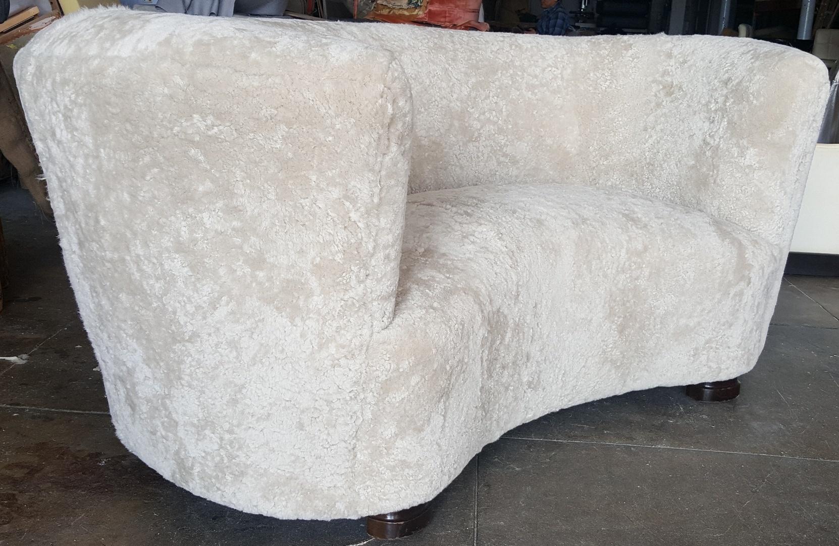 Scandinavian Modern Viggo Boesen Curved Sofa upholstered in Cream Shearling