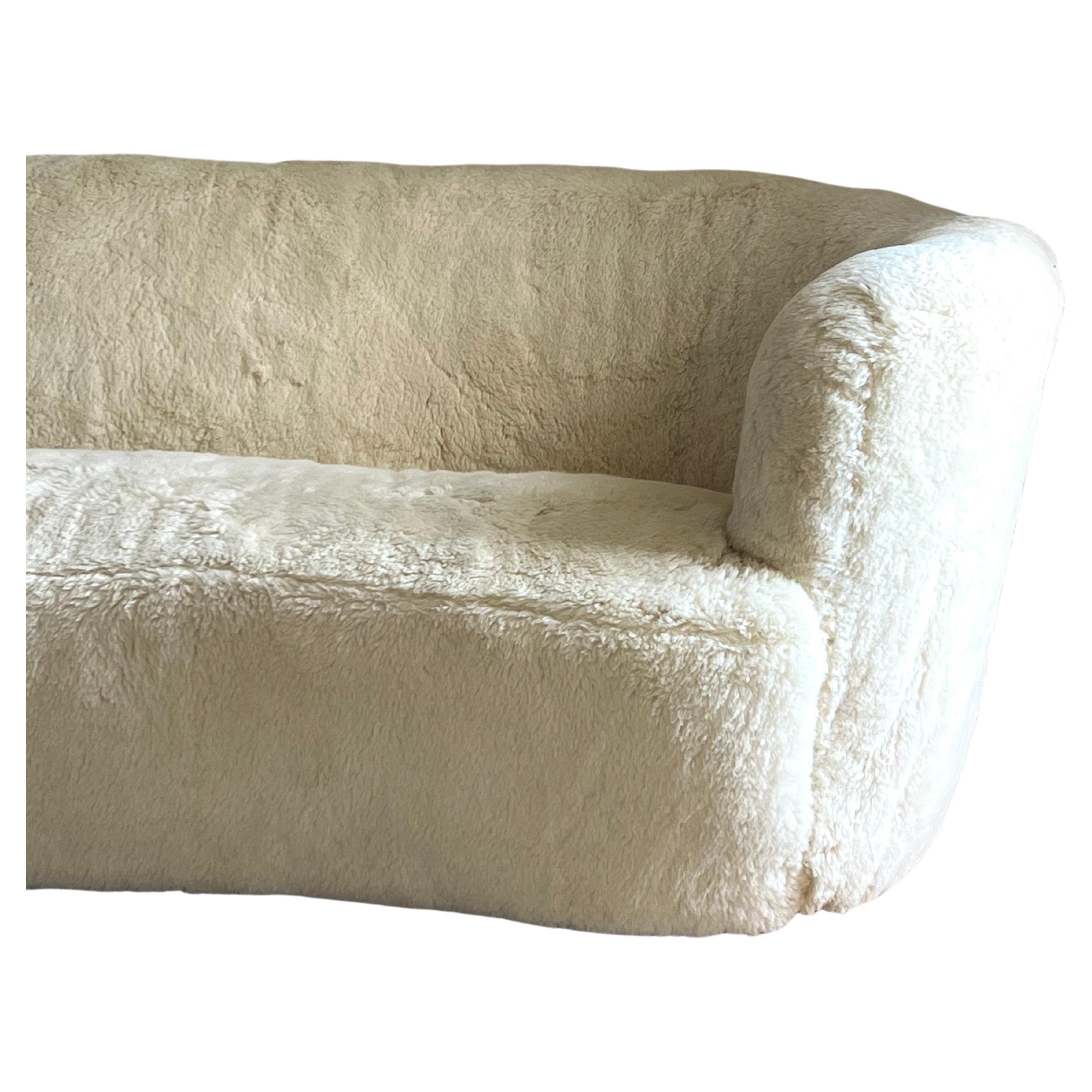 Viggo Boesen Curved Sofa upholstered in Cream Shearling