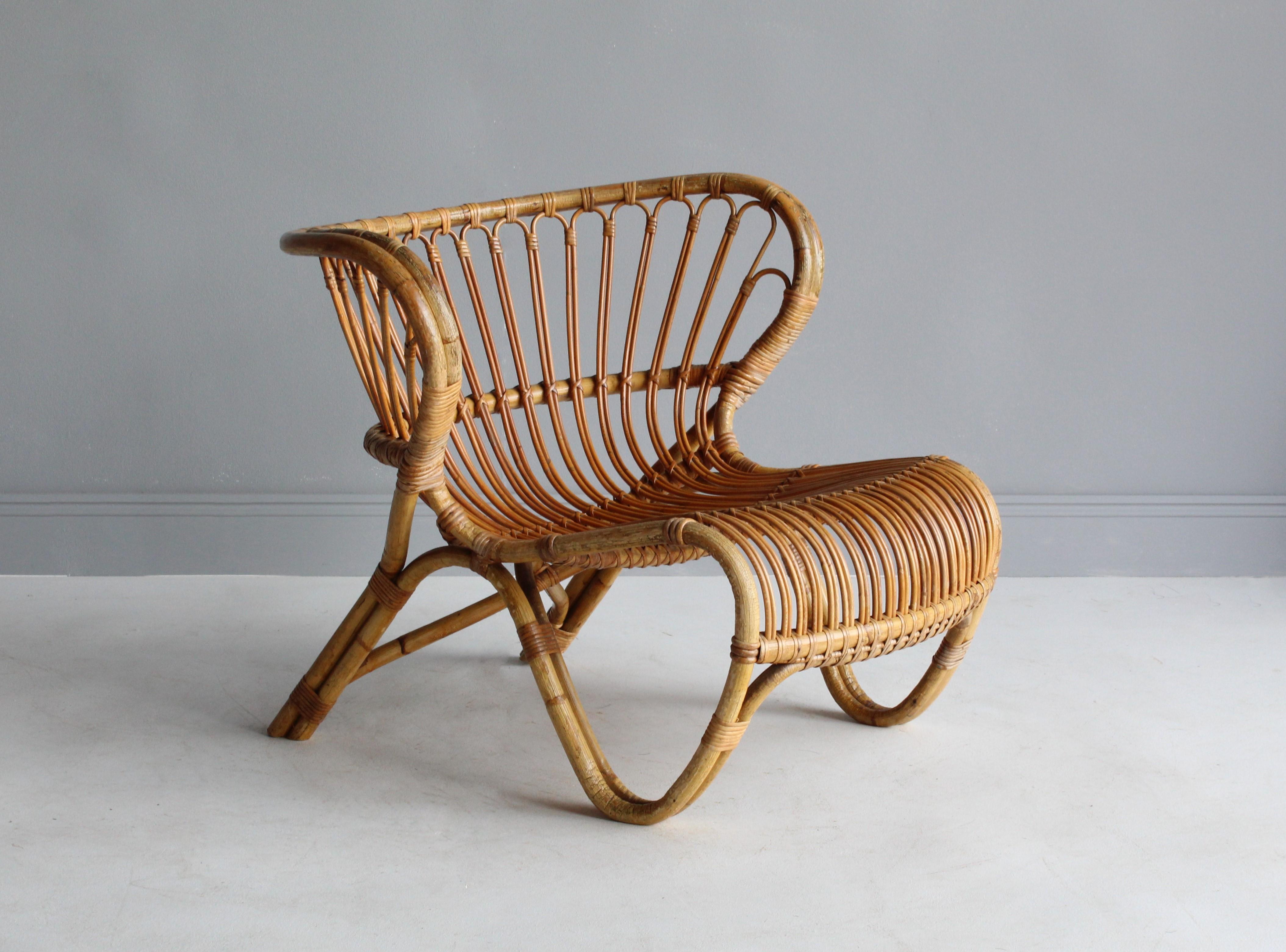 An early example of Viggo Boesens iconic bamboo chair model b 237. This example is lightly restored, near the original condition. Produced by E. V. A. Nissen & Co., Denmark. 

  

 