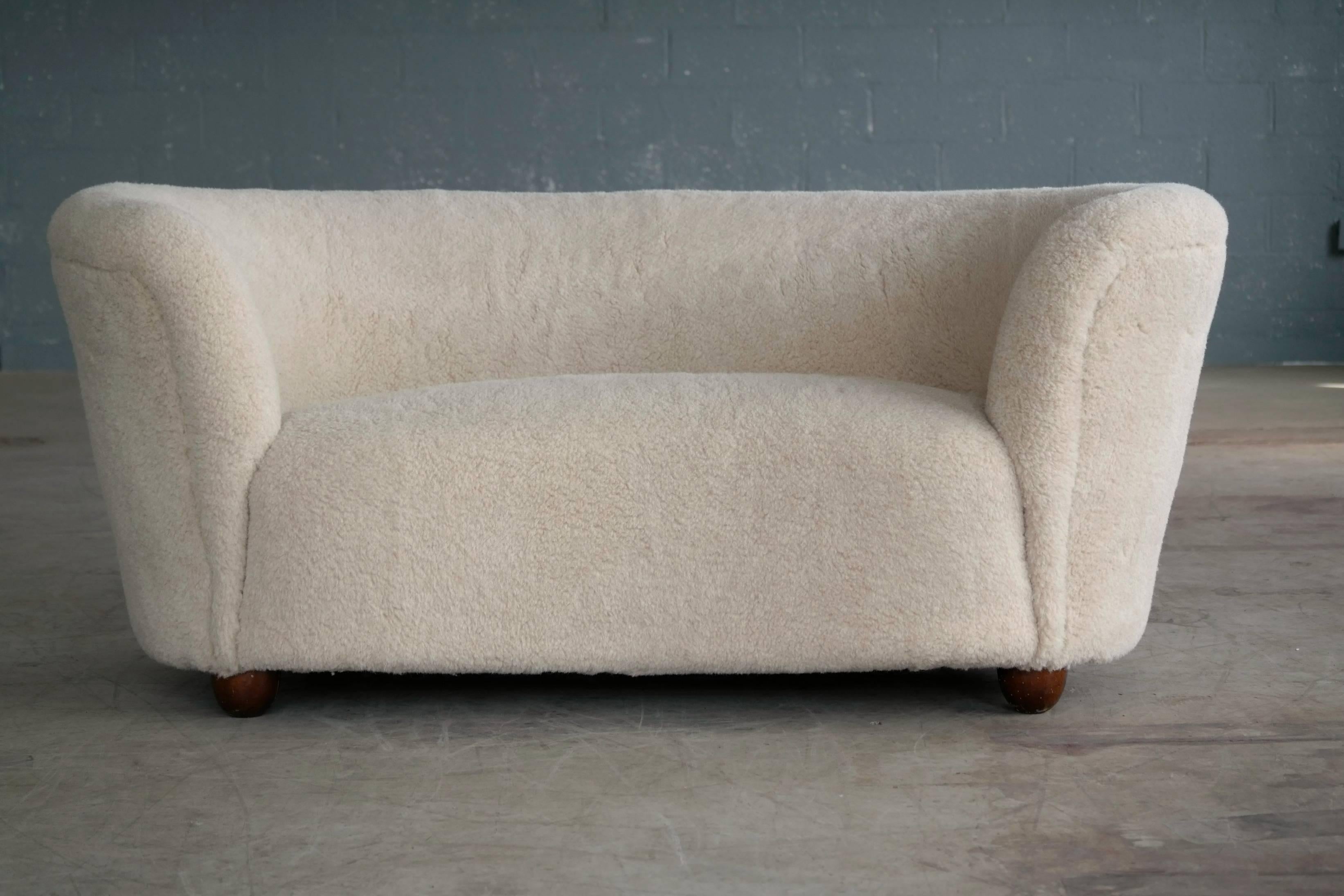 Mid-Century Modern Viggo Boesen Style Banana Shaped Curved Loveseat or Sofa Covered in Lambs, 1940s