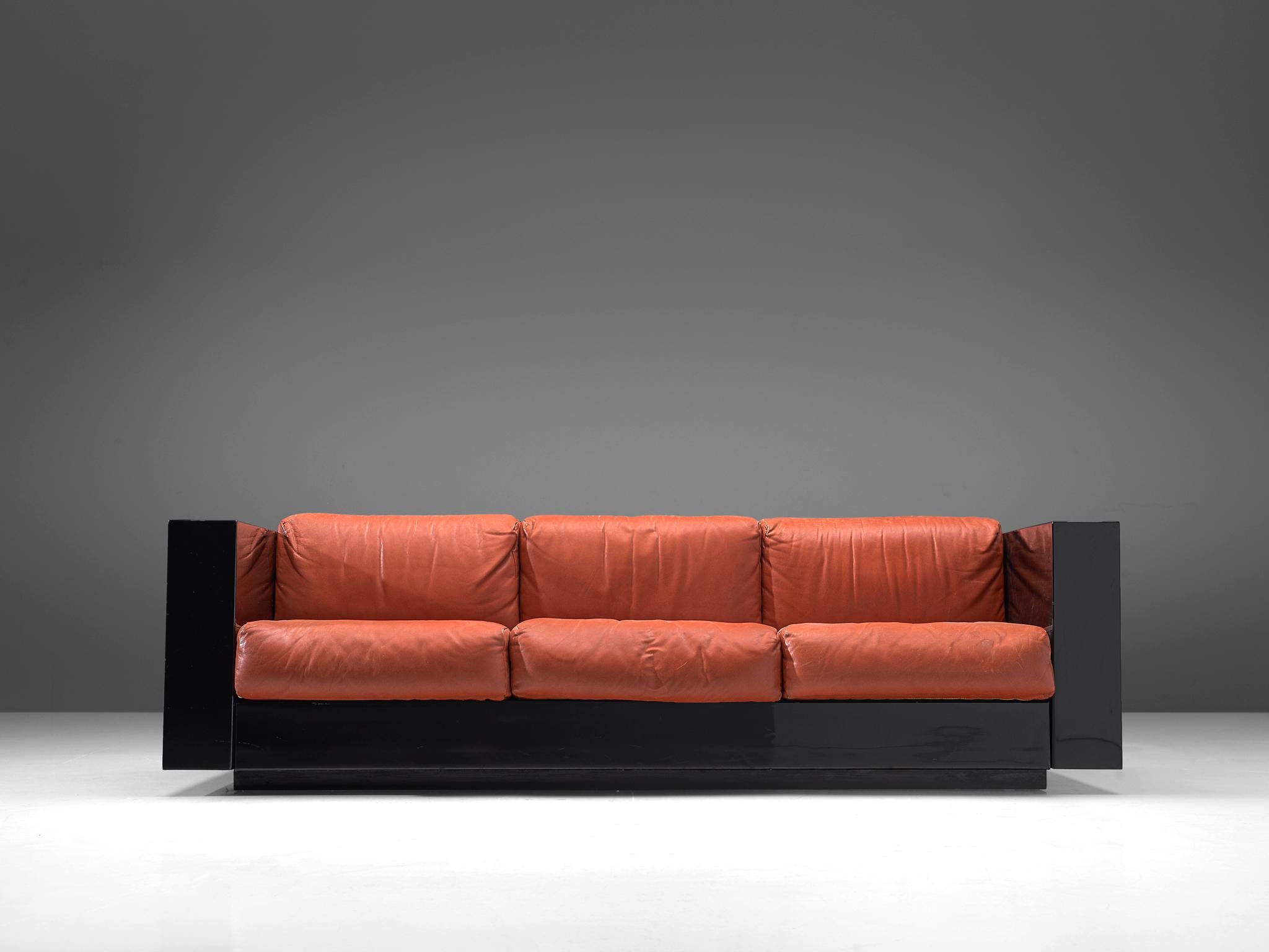 Massimo and Lella Vignelli for Poltronova, 'Saratoga' three-seat sofa, polyester lacquer and red leather, Italy, 1964.

This three-seat sofa named 'Saratoga' is designed by Italian designer couple Lella & Massimo Vignelli. The Vignelli's were