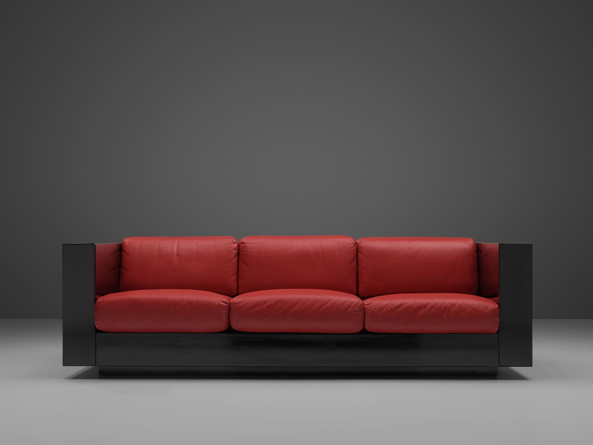 Massimo and Lella Vignelli for Poltronova, 'Saratoga' three-seat sofa, polyester lacquer and red leather, Italy, 1964.

This sofa named 'Saratoga' is designed by Italian designer couple Lella & Massimo Vignelli. The Vignelli's were known for their