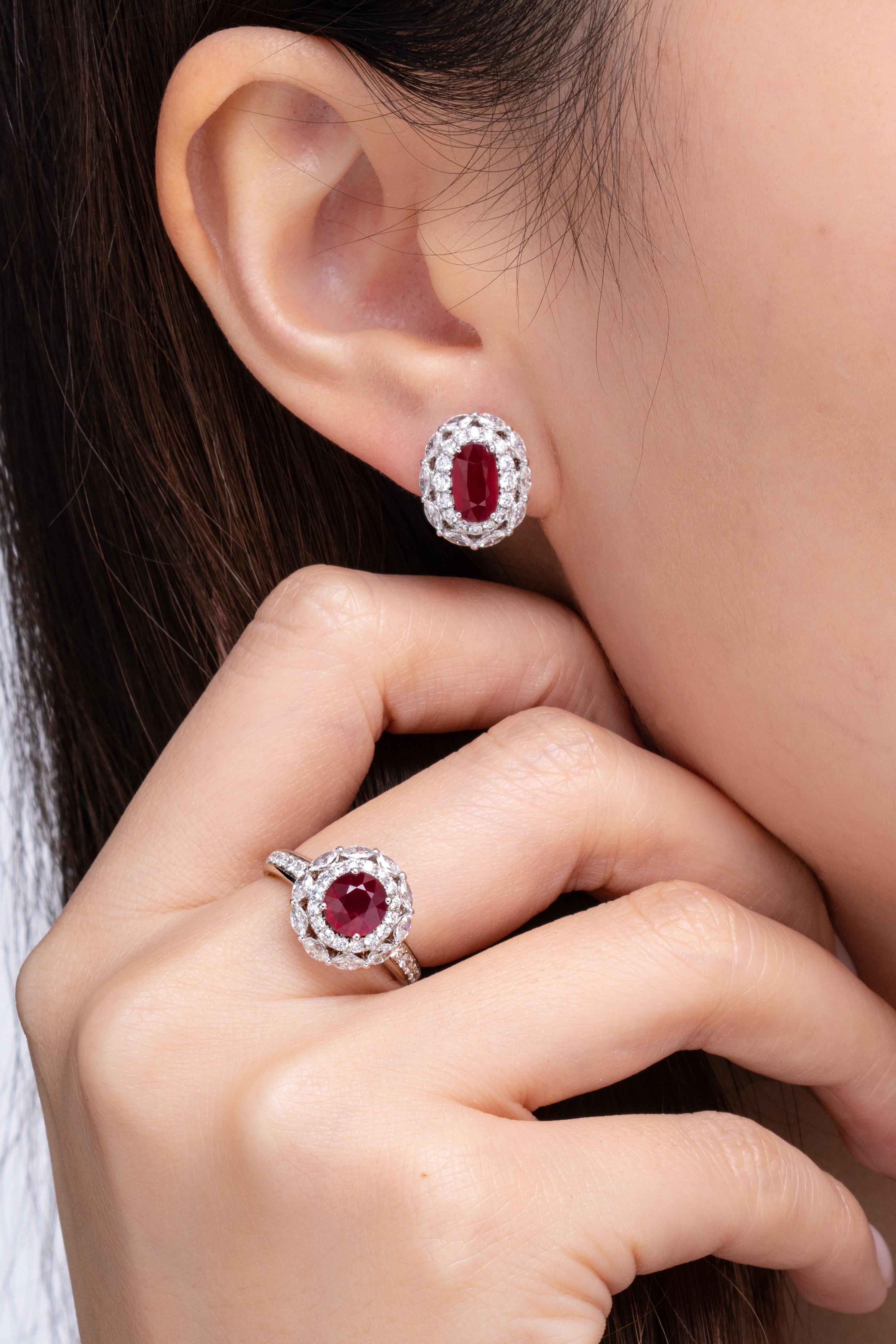 Pigeon's Blood rubies are considered the most prestigious color grading amongst rubies worldwide. This set certifies that all 3 oval shape rubies are Mozambique Pigeon's Blood rubies that have not been artificially heated. The ruby ring is 1.53