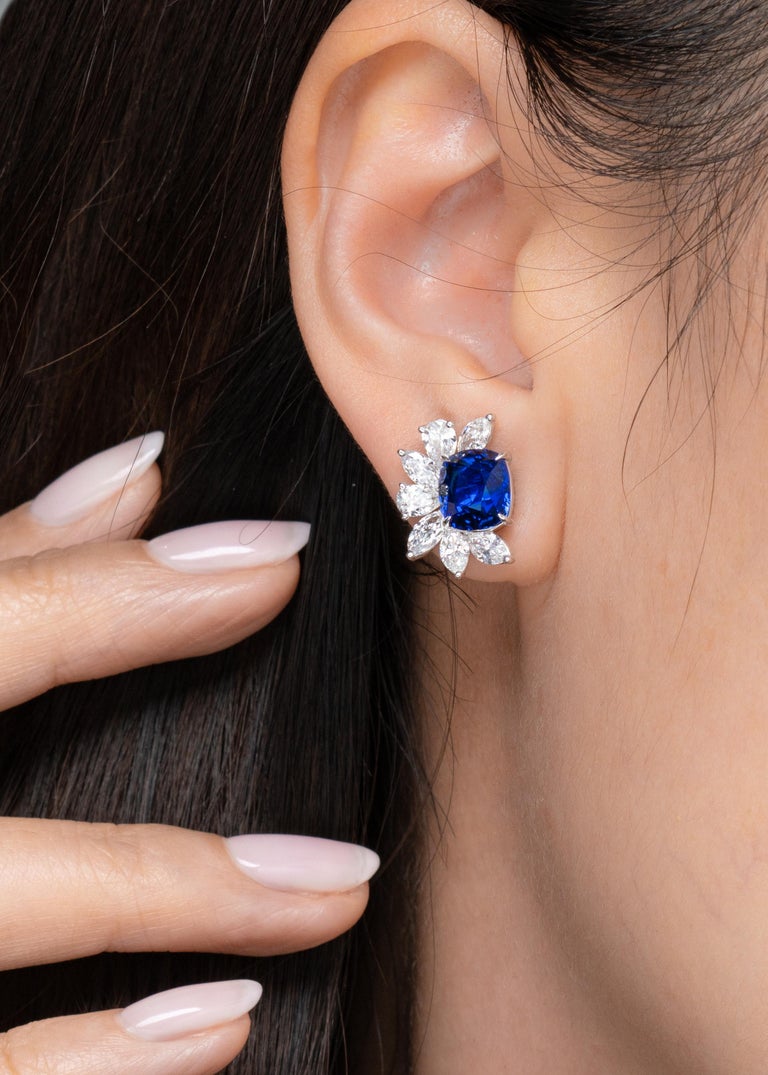 Sapphires - a timeless gemstone with an eye-catching appeal. This Vihari Jewels pair of Royal Blue cushion shape Sapphire earrings feature a 3.48 carat and 3.30 carat matching pair that will never go out of style. GRS (#2020-088222) has certified