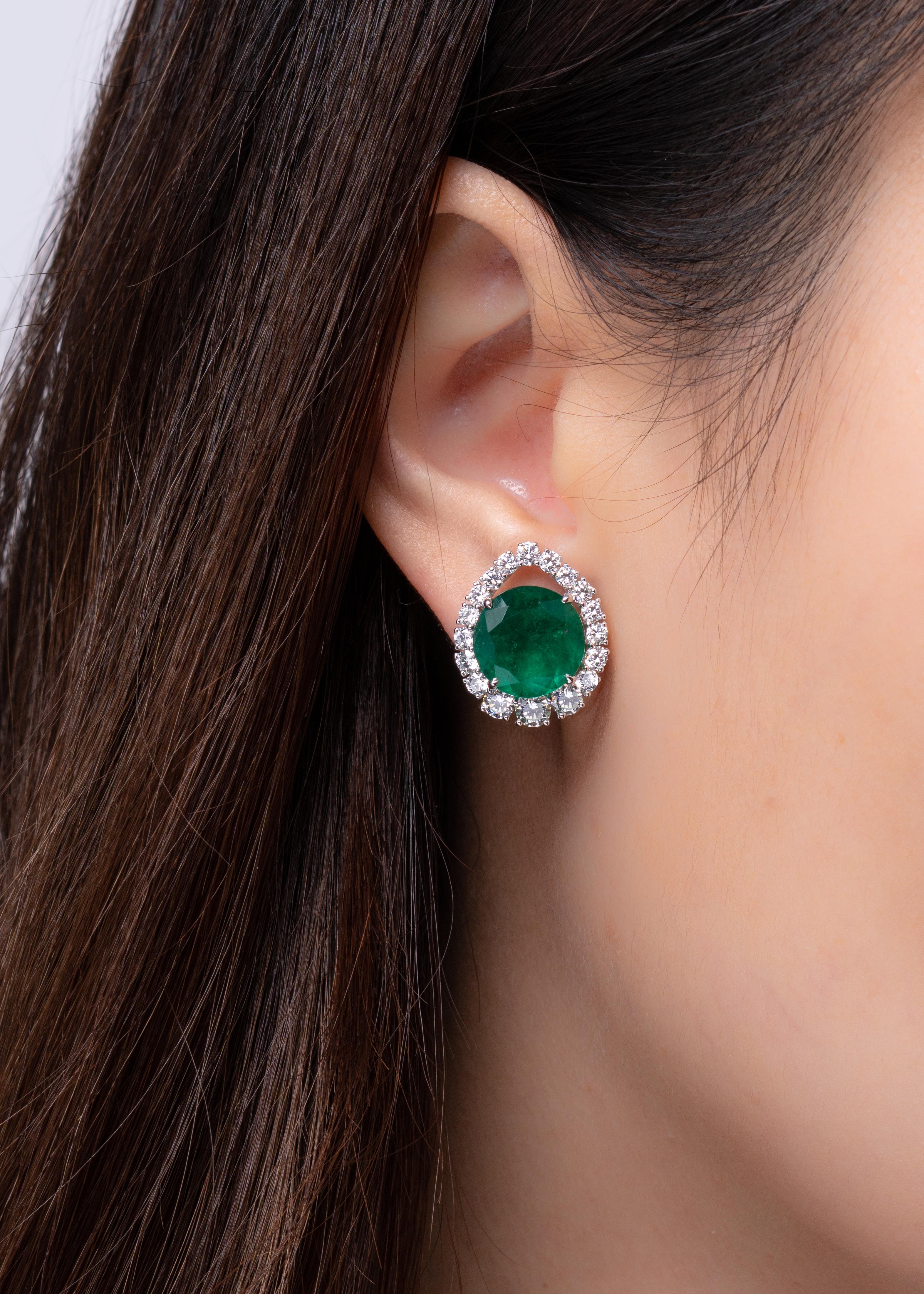 This piece is available for custom order only. 

A matching pair of round Colombian Emeralds - a shape so rare for this gemstone, that it leaves onlookers captivated. The pair features a 4.36 carat (Gubelin Certificate #18041034) and a 3.89 carat