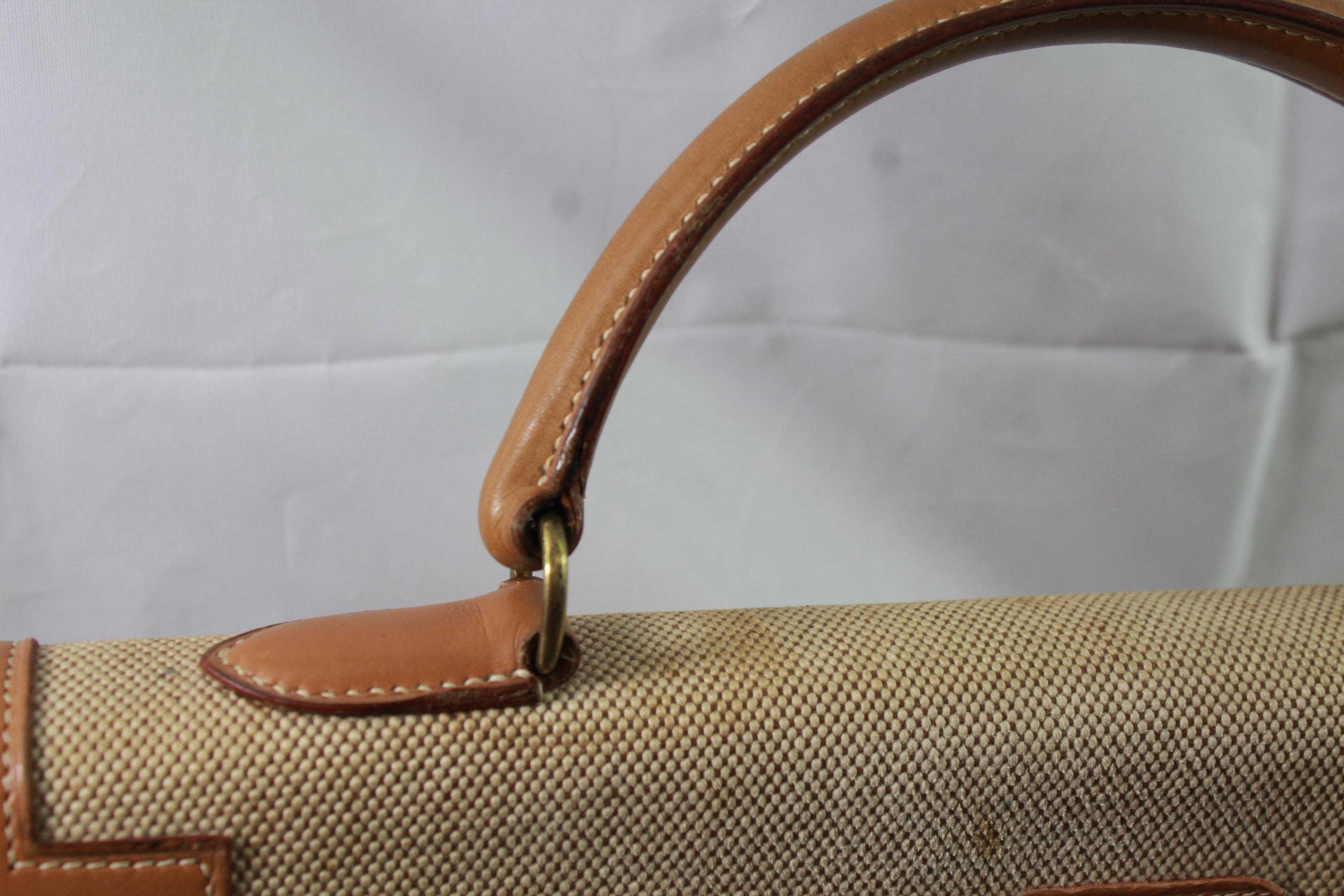 Viintage Hermes Kelly 35 in Brown Leather and Canvas. Fair condition In Fair Condition In Paris, FR
