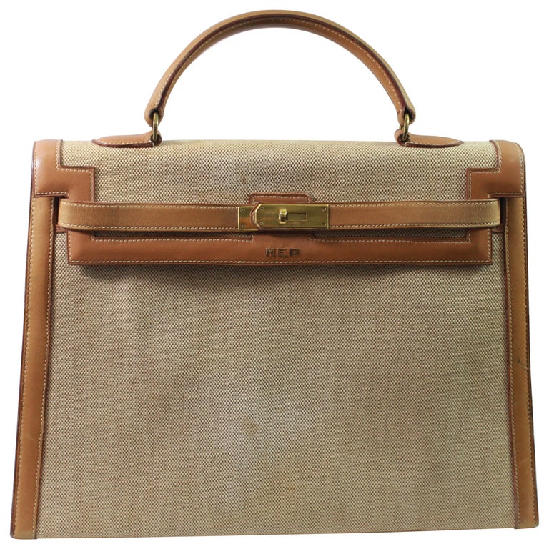Viintage Hermes Kelly 35 in Brown Leather and Canvas. Fair condition at ...