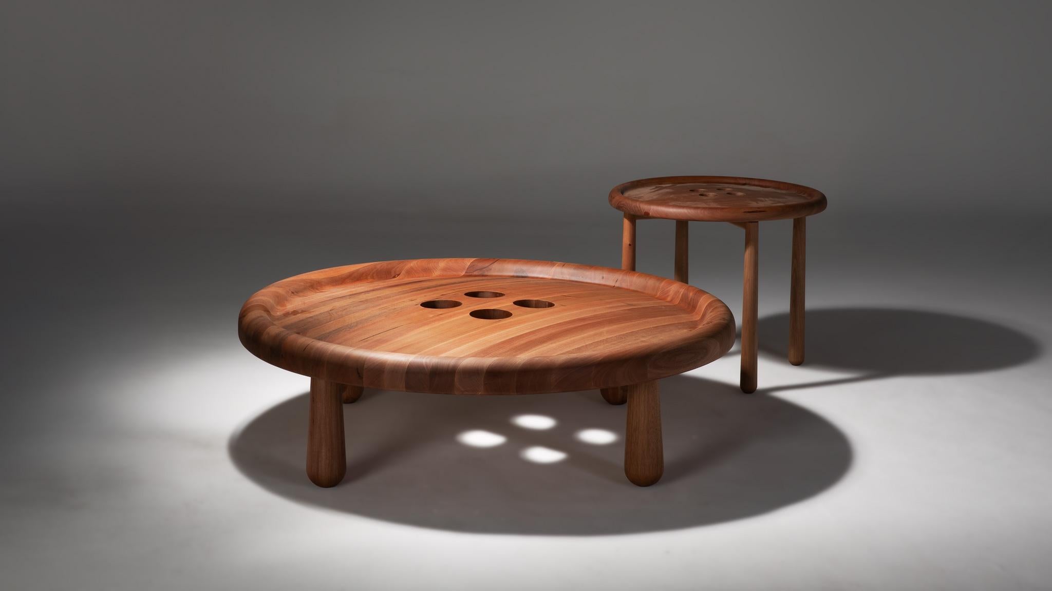 Renowned Brazilian artist and button collector Vik Muniz reimagines a small everyday object on a grand scale with this sculptural coffee table, designed in collaboration with +55design. Offered in three stunning material variations—including solid