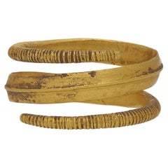 Antique Viking gold coiled ring, circa 9th-11th century AD.