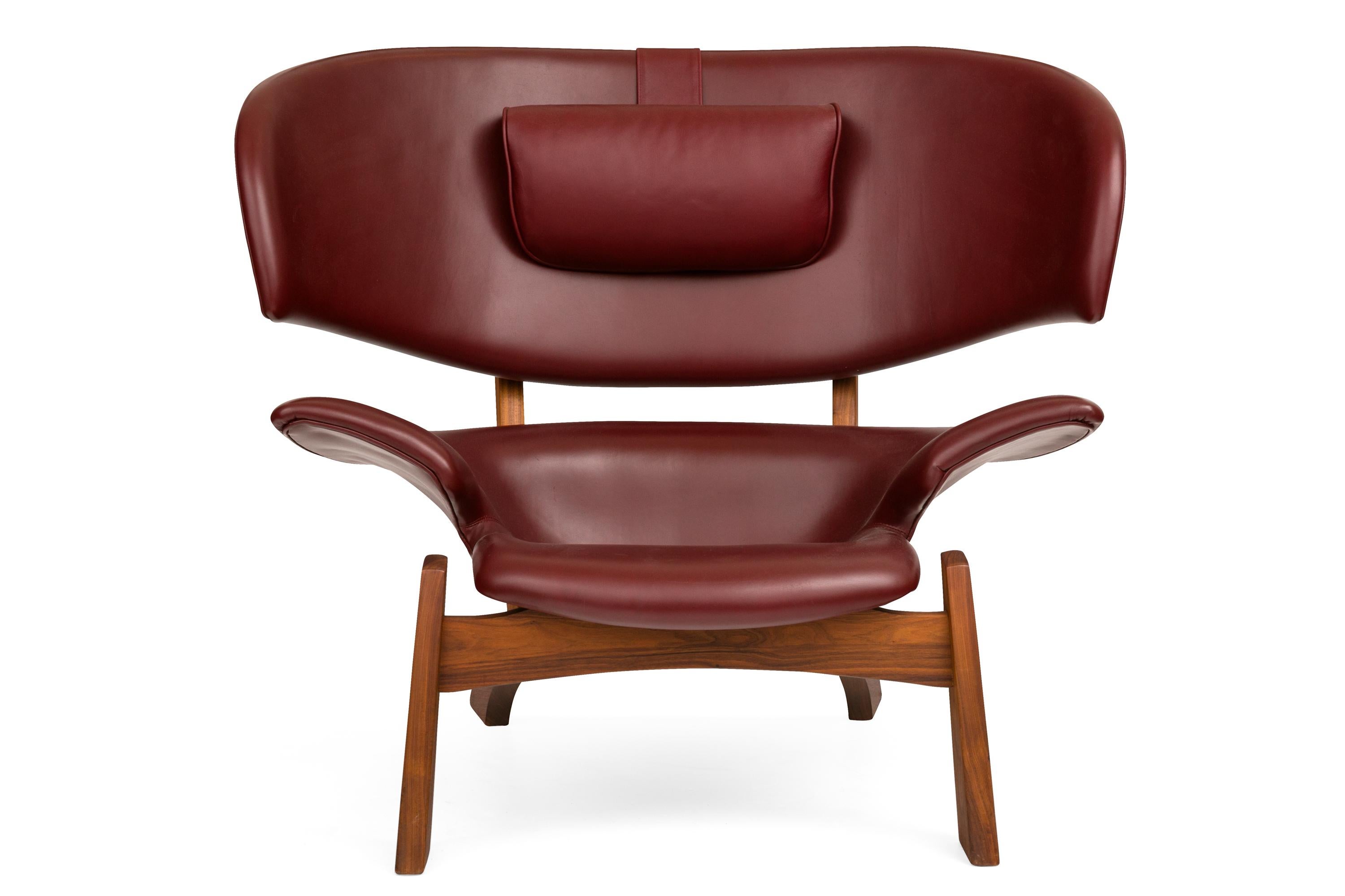 "Viking" Lounge Chair and Ottoman in Walnut and Bordeaux Aniline