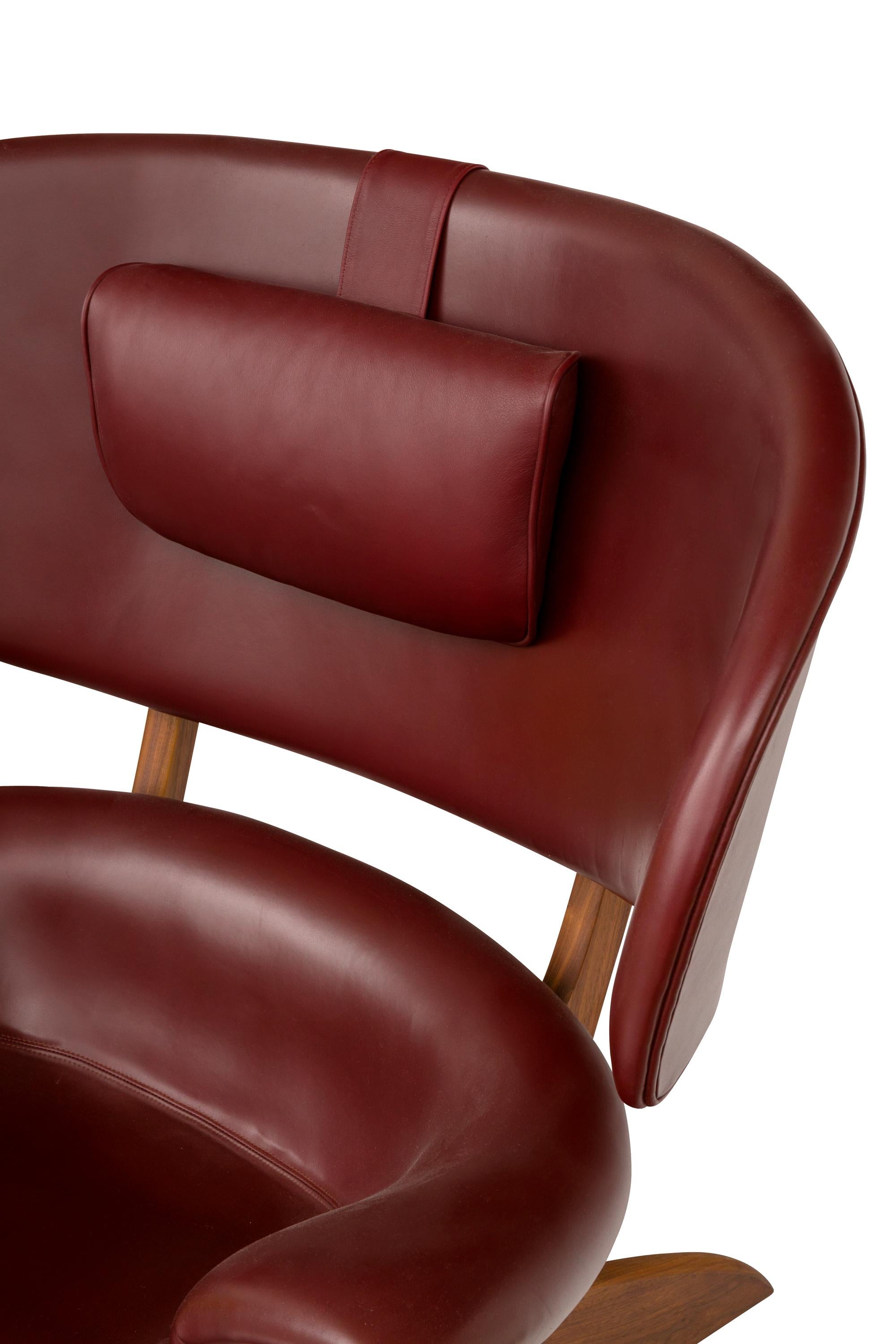 "Viking" Lounge Chair and Ottoman in Walnut and Bordeaux Aniline