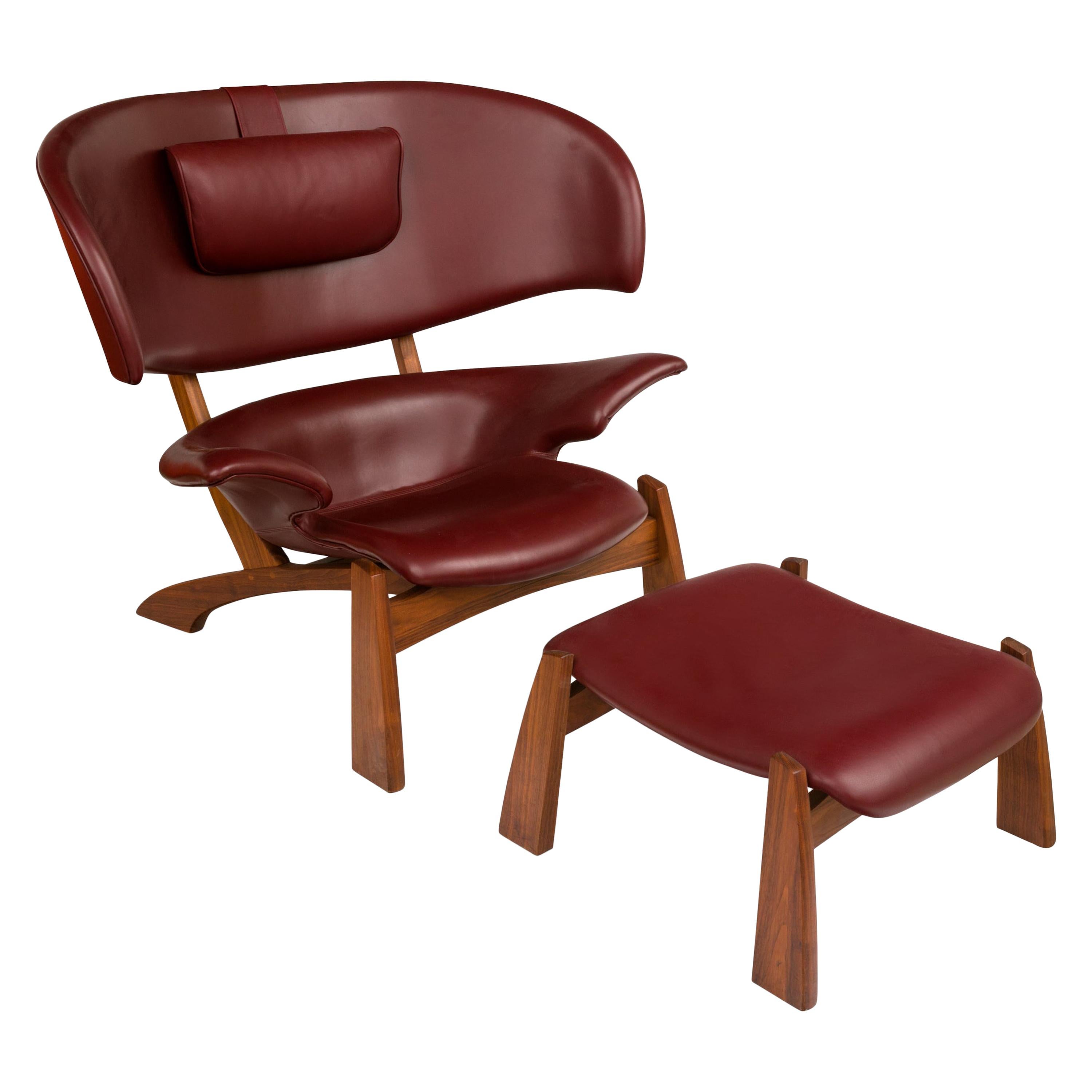 "Viking" Lounge Chair and Ottoman in Walnut and Bordeaux Aniline