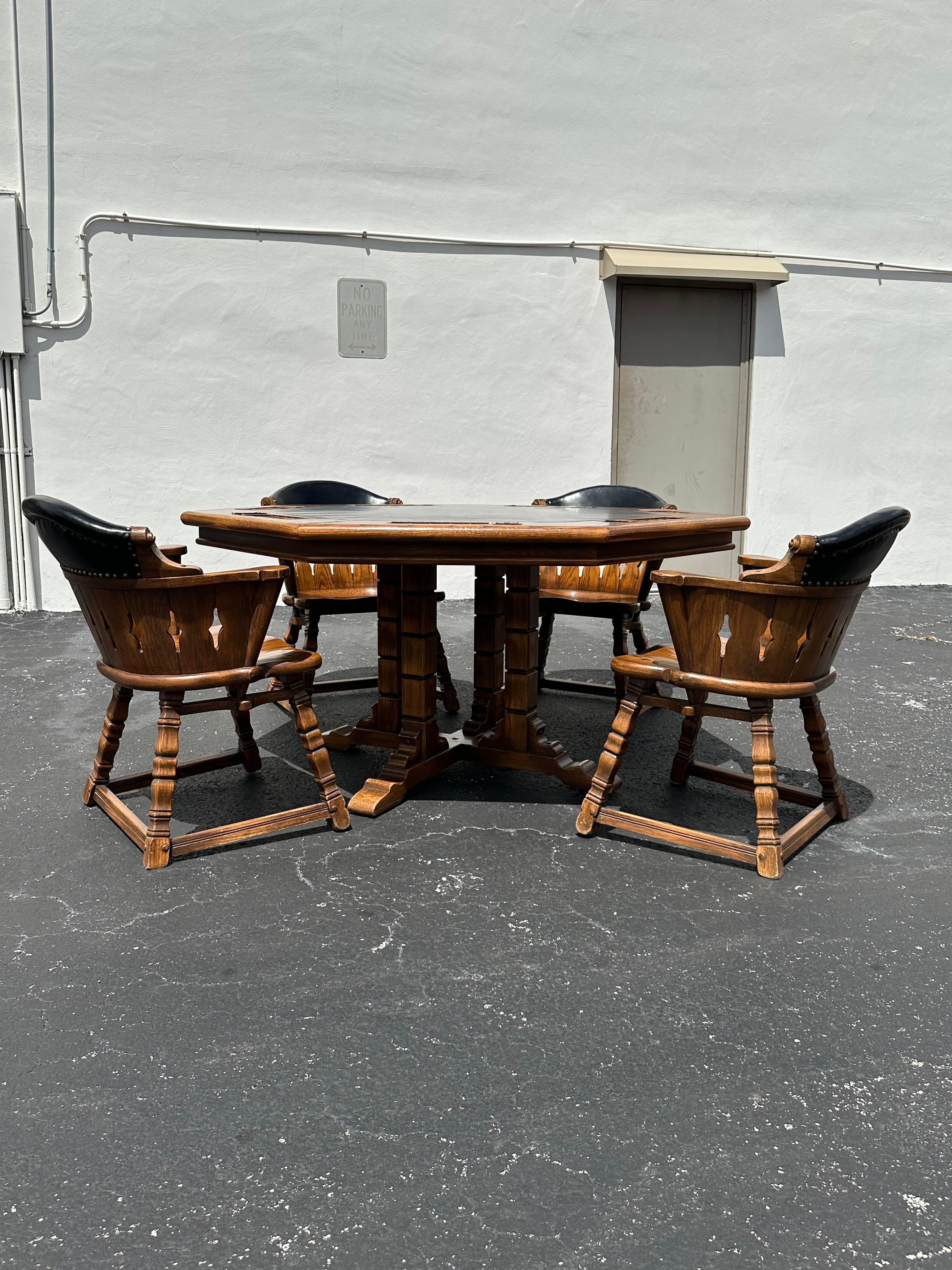 This outstanding viking oak poker table by Romweber must have been a cherished possession. It’s truly astonishing to find a poker set in such amazing condition after nearly five decades. The Viking oak set is seven sided. Solid oak chip holders are