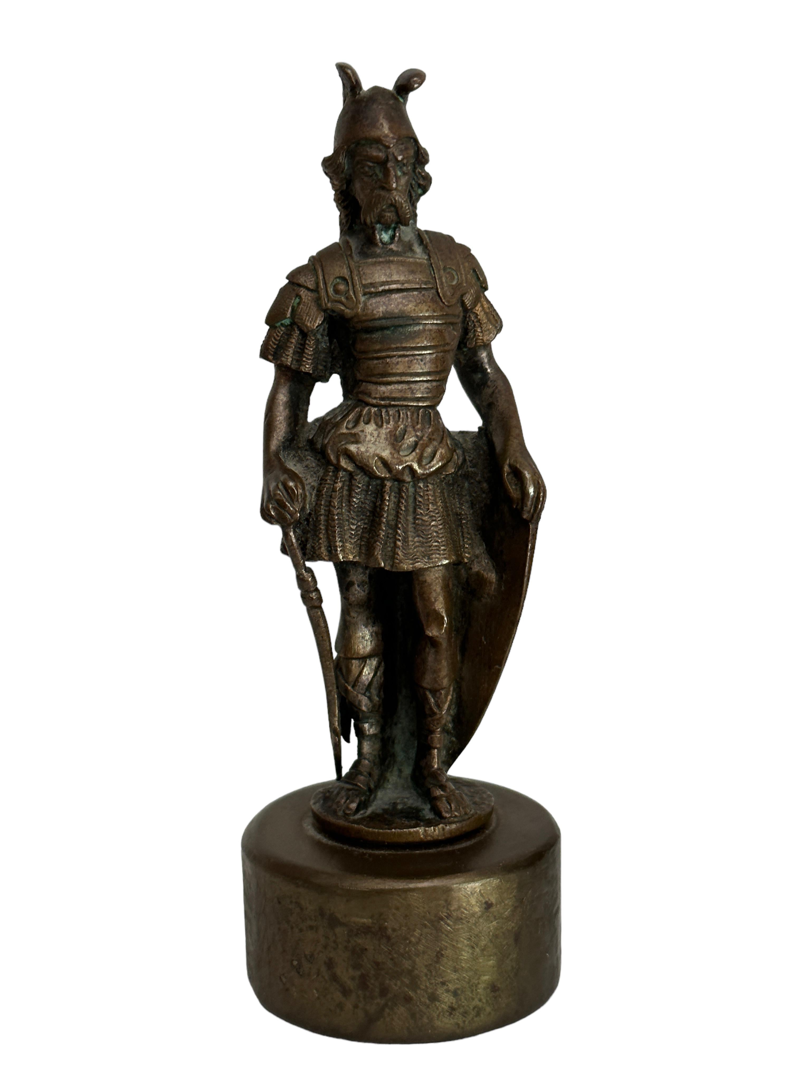 A gorgeous classic decorative Statue or Miniature Sculpture. Some wear with a nice patina, but this is old-age. Made of a kind of metal, we think it's bronze or brass. Very decorative and nice to display in your collection of miniatures or any room.