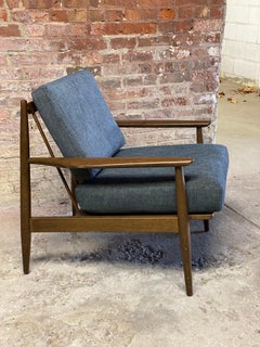 Viko Baumritter - Poltrona con schienale a fuso in stile medio moderno