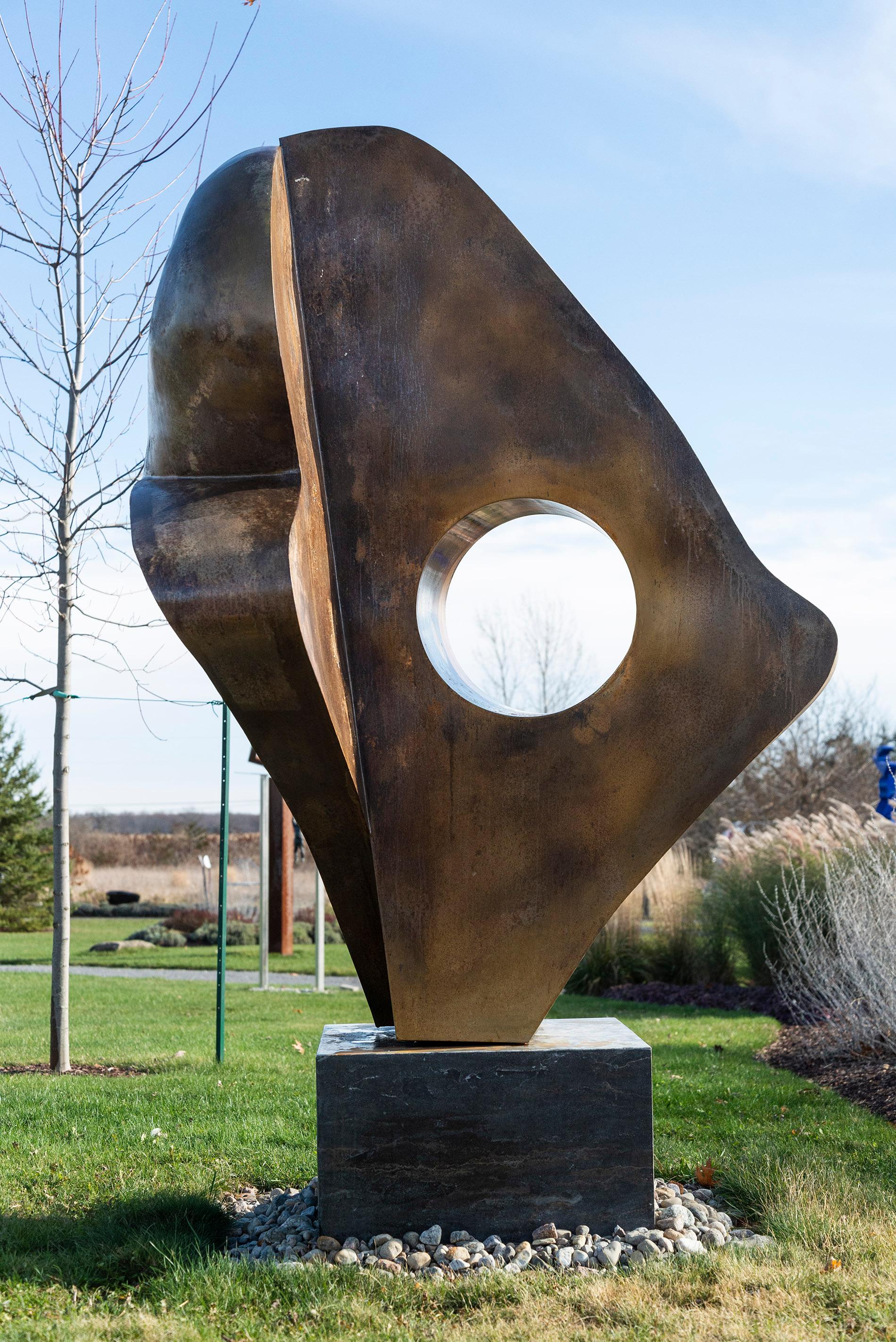 ‘Andromeda,’ Viktor Mitic’s grand contemporary outdoor sculpture forged from stainless steel has a burnished gloss finish and is accented in 24 kt. gold. The abstract fluid lines of this powerful piece are accentuated by the light-reflecting quality