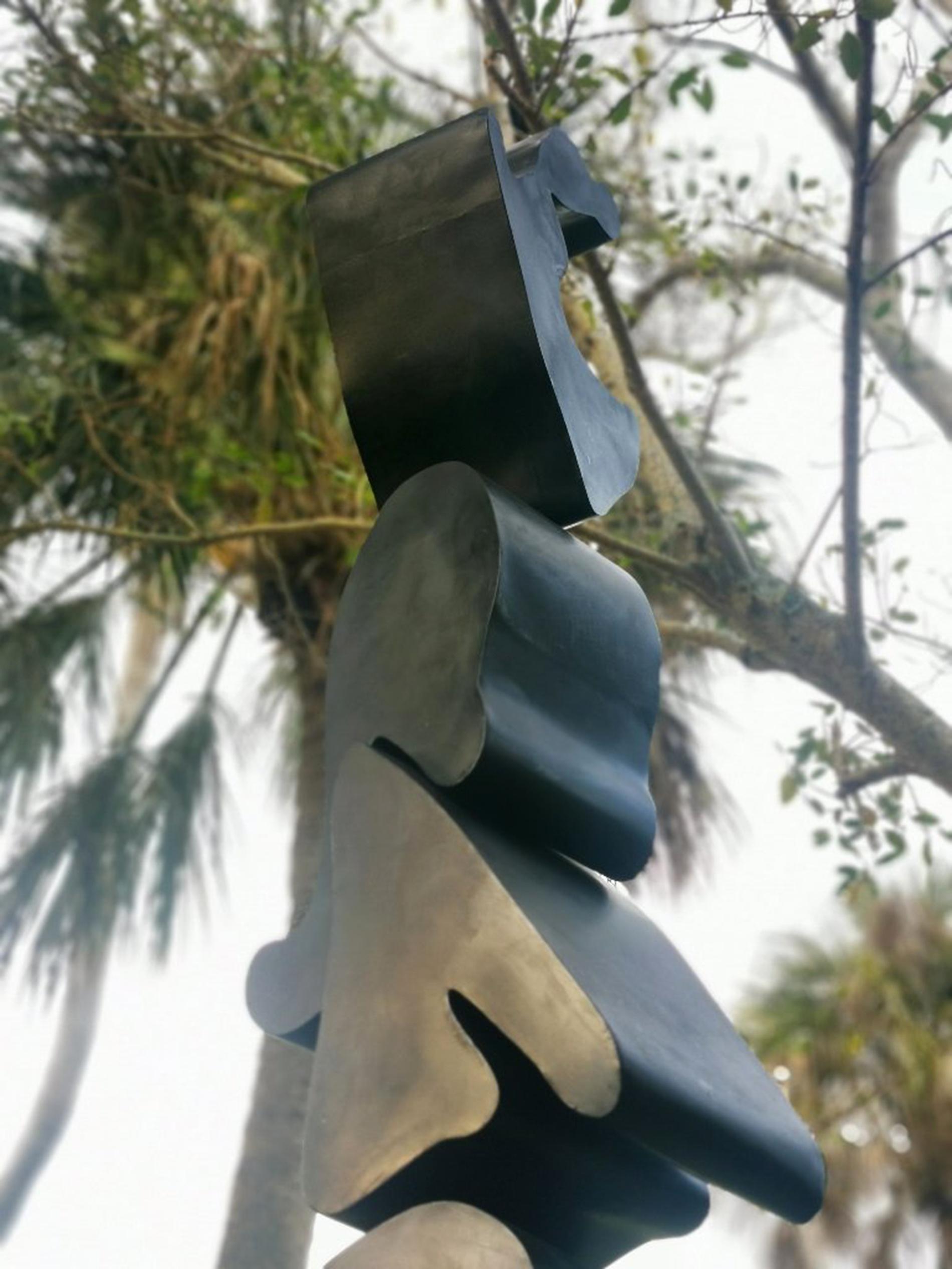 An imposing fourteen-foot tower of curved abstract shapes is fabricated from stainless steel in this new sculpture from Viktor Mitic. He is known for his colourful abstract paintings and sculptures that were inspired by paint drippings on his studio