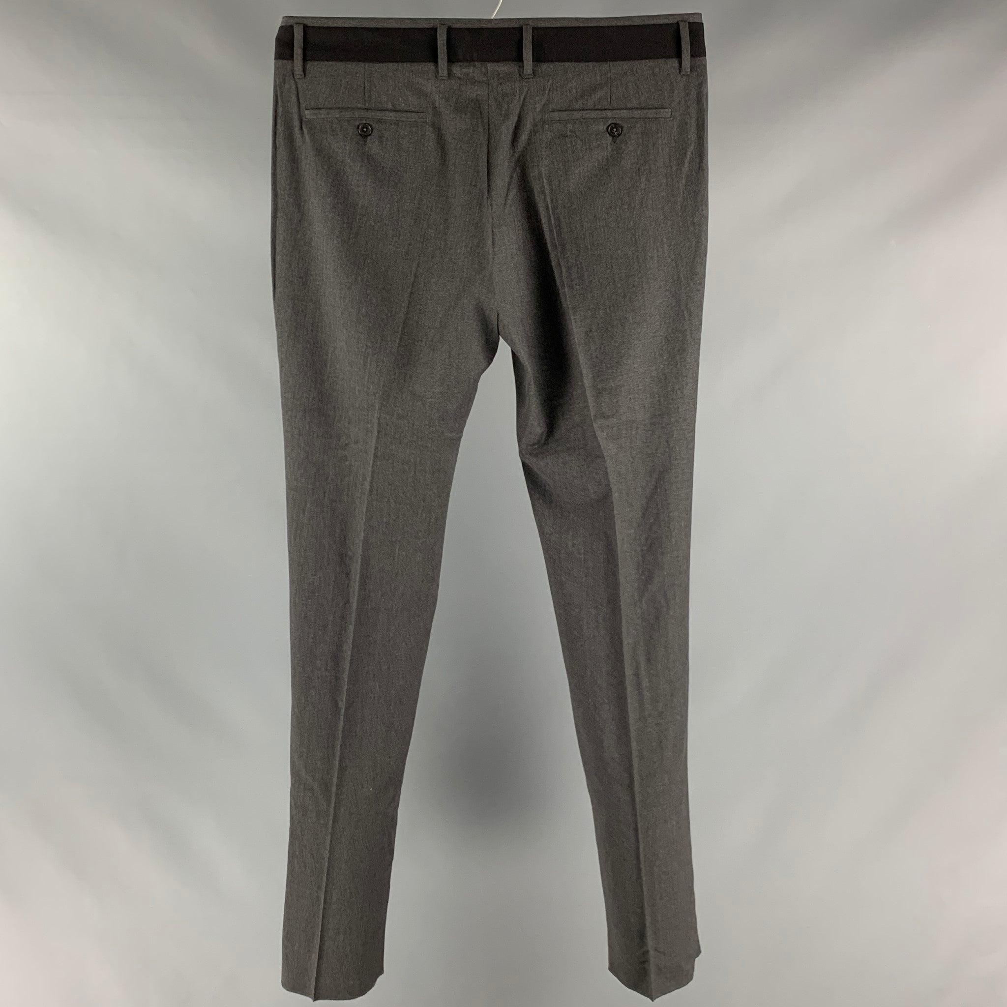 VIKTOR & ROLF tuxedo dress pants comes in a dark gray & black wool featuring a flat front, slim fit, front tab, and a zip fly closure. Made in Italy. New with Tags. 

Marked:  54 

Measurements: 
 Waist: 38 inches Rise: 8 inches Inseam: 38 inches 
