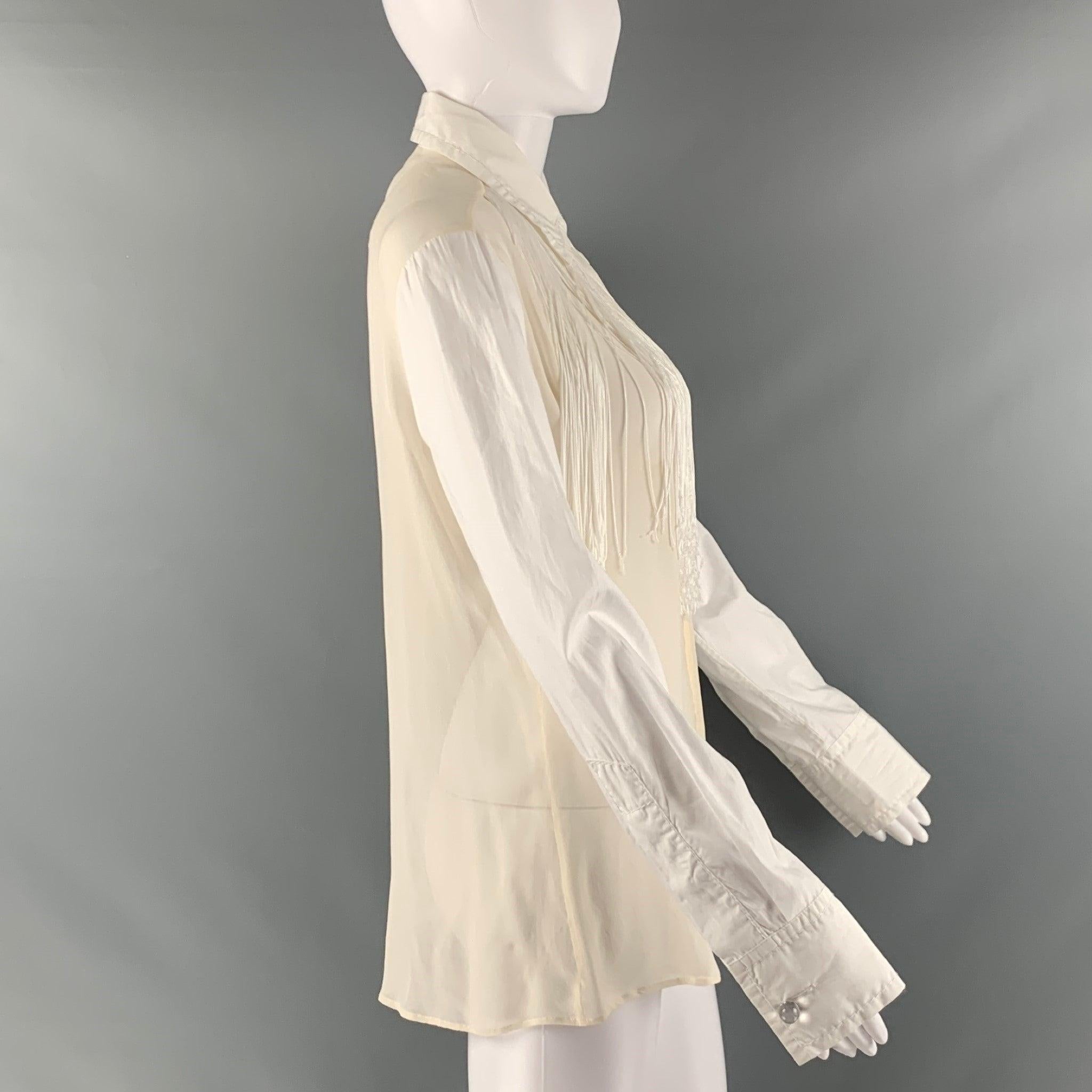 VIKTOR & ROLF shirt comes in a white and beige cotton woven material featuring a see through style, white fringe trim, spread collar, and a button up closure. Made in Italy. Excellent Pre-Owned Condition.  

Marked:   42 

Measurements: 
 
Shoulder: