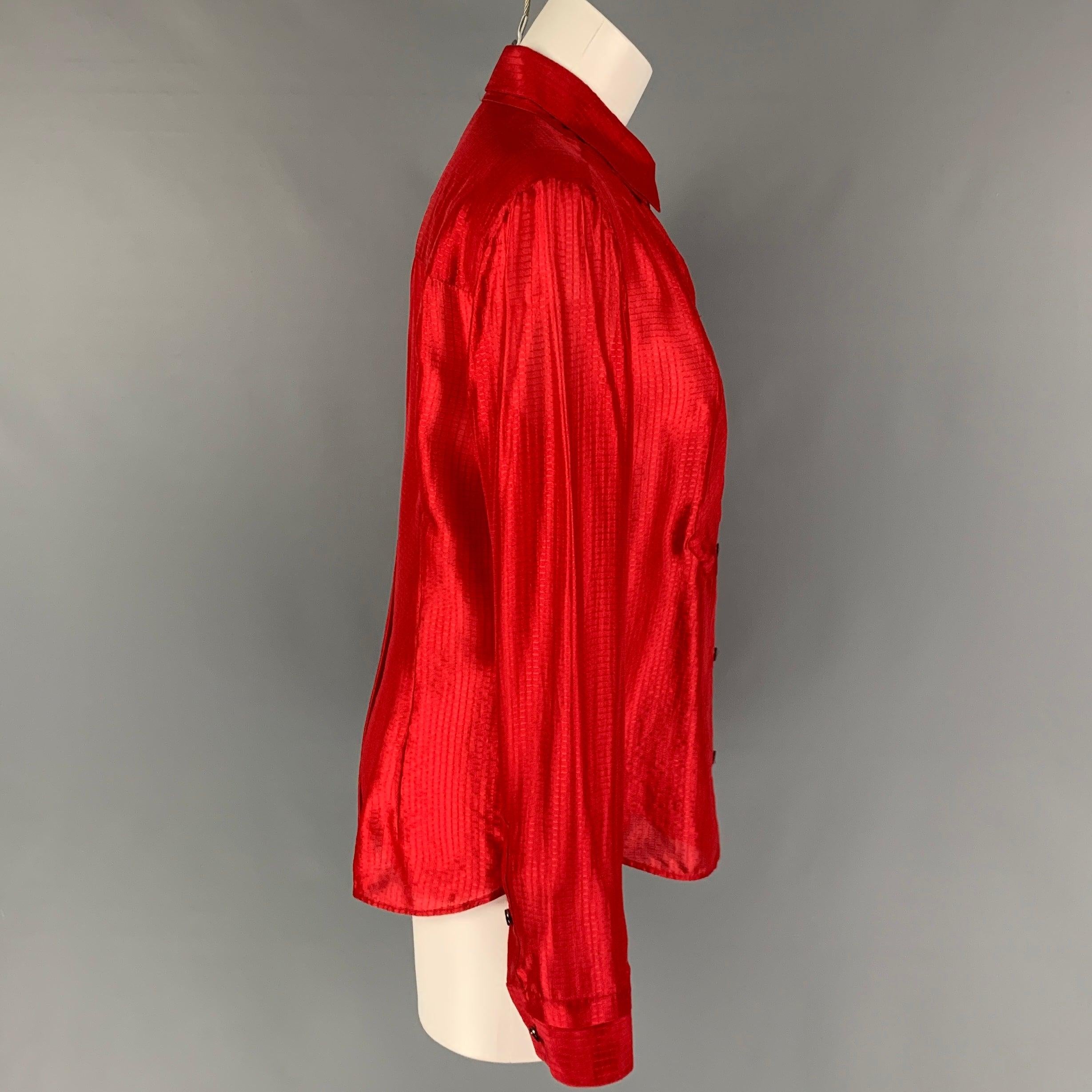 VIKTOR & ROLF shirt comes in a red textured silk featuring a double layer collar and a buttoned closure. Made in Italy.
New With Tags.
 

Marked:   46 

Measurements: 
 
Shoulder: 16.5 inches  Bust: 38 inches  Sleeve:
25 inches  Length: 26 inches 
 