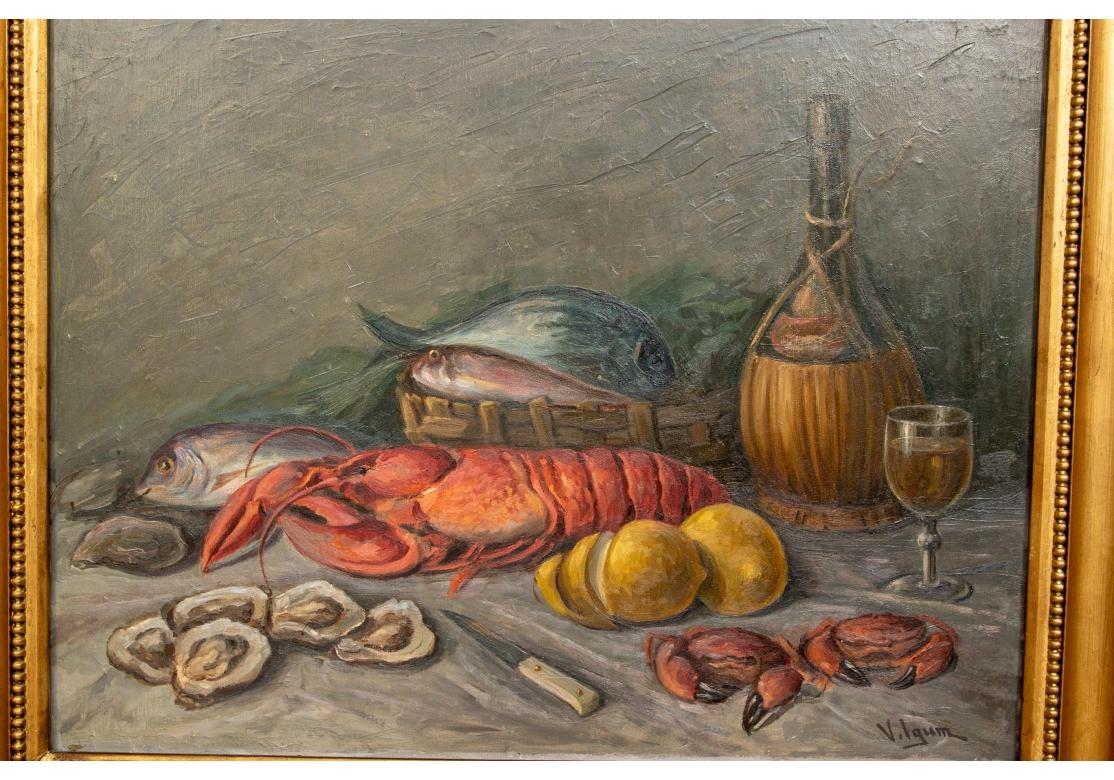 Oil on canvas depicting a still life with fruits of the sea including various shell fish and lobster together with a bottle of wine and glass on a table top surface.
Signed Vilgum lower right.
Presented in a carved gilt frame with relief fruit