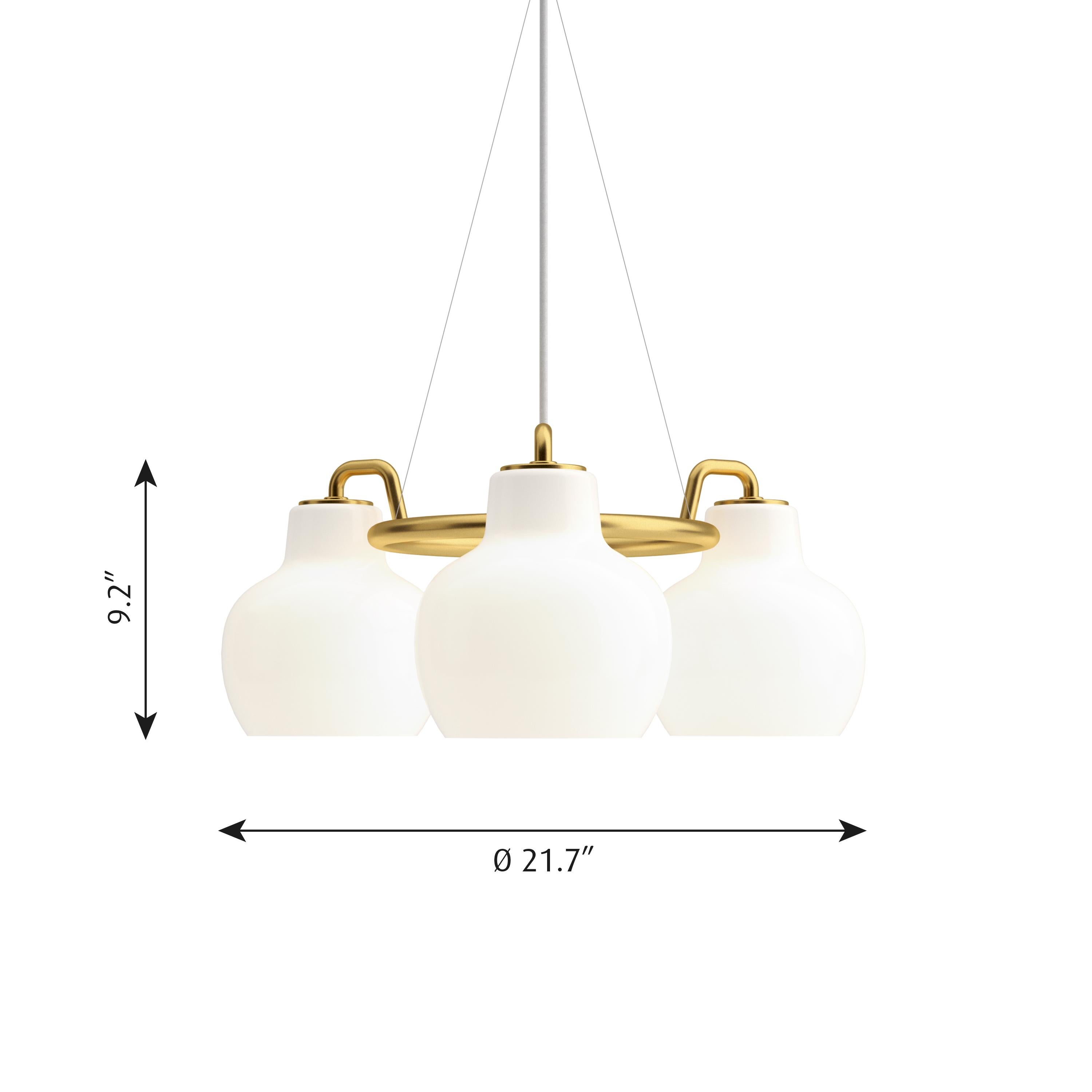 Vilhelm Lauritzen 3-shade brass and glass ring chandelier for Louis Poulsen. Executed in three hand blown glossy white opal glass and untreated polished brass tube and ceiling canopy. The chandelier emits light directed primarily downwards. The opal