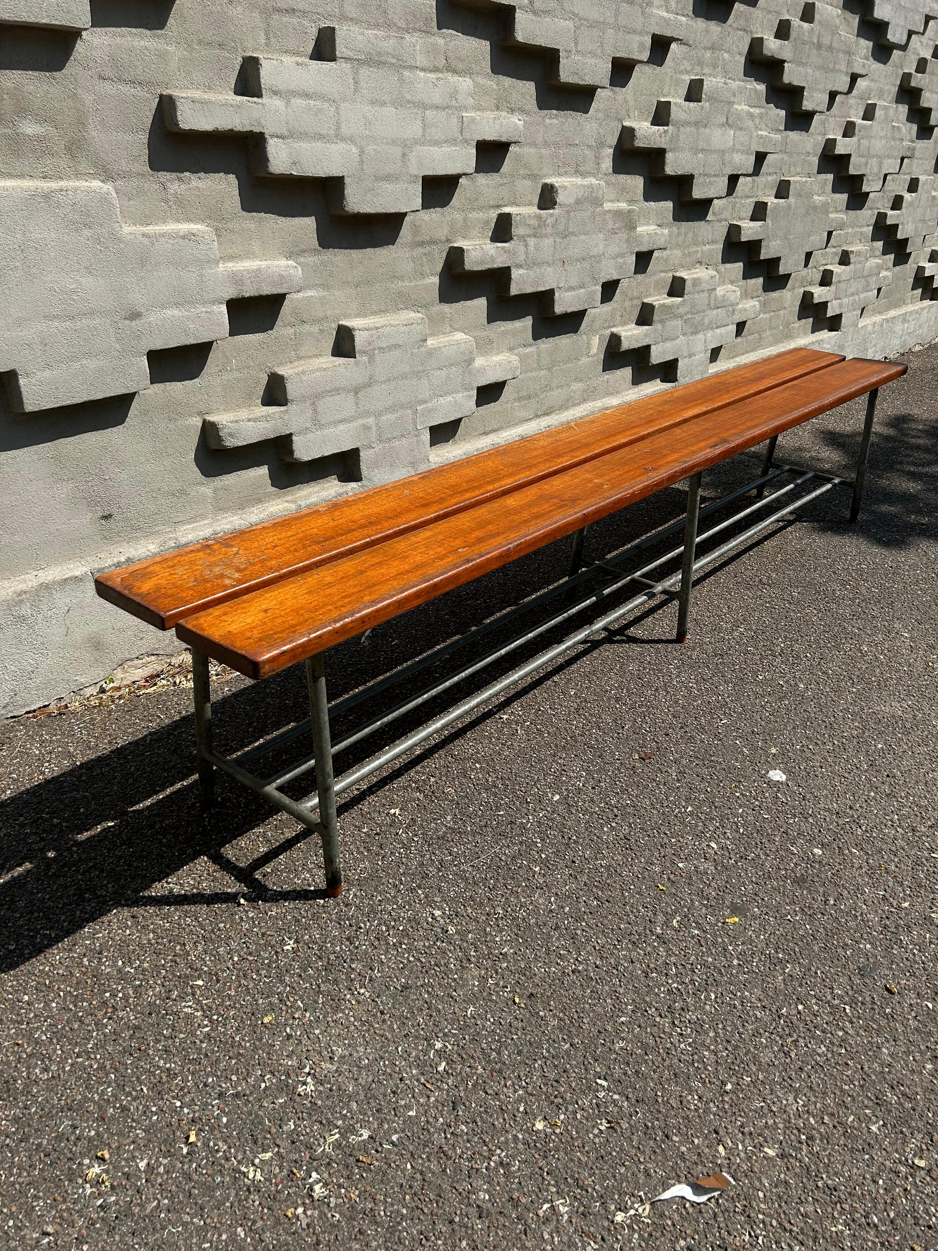 Rare and important bench in steel and teak made on commission for Mørkhøj Skole by Danish architect Vilhelm Lauritzen in the 1960s.

The bench has a base made of steel tubes with teak shoes and a top of two pieces of solid teak.

Vilhelm Theodor