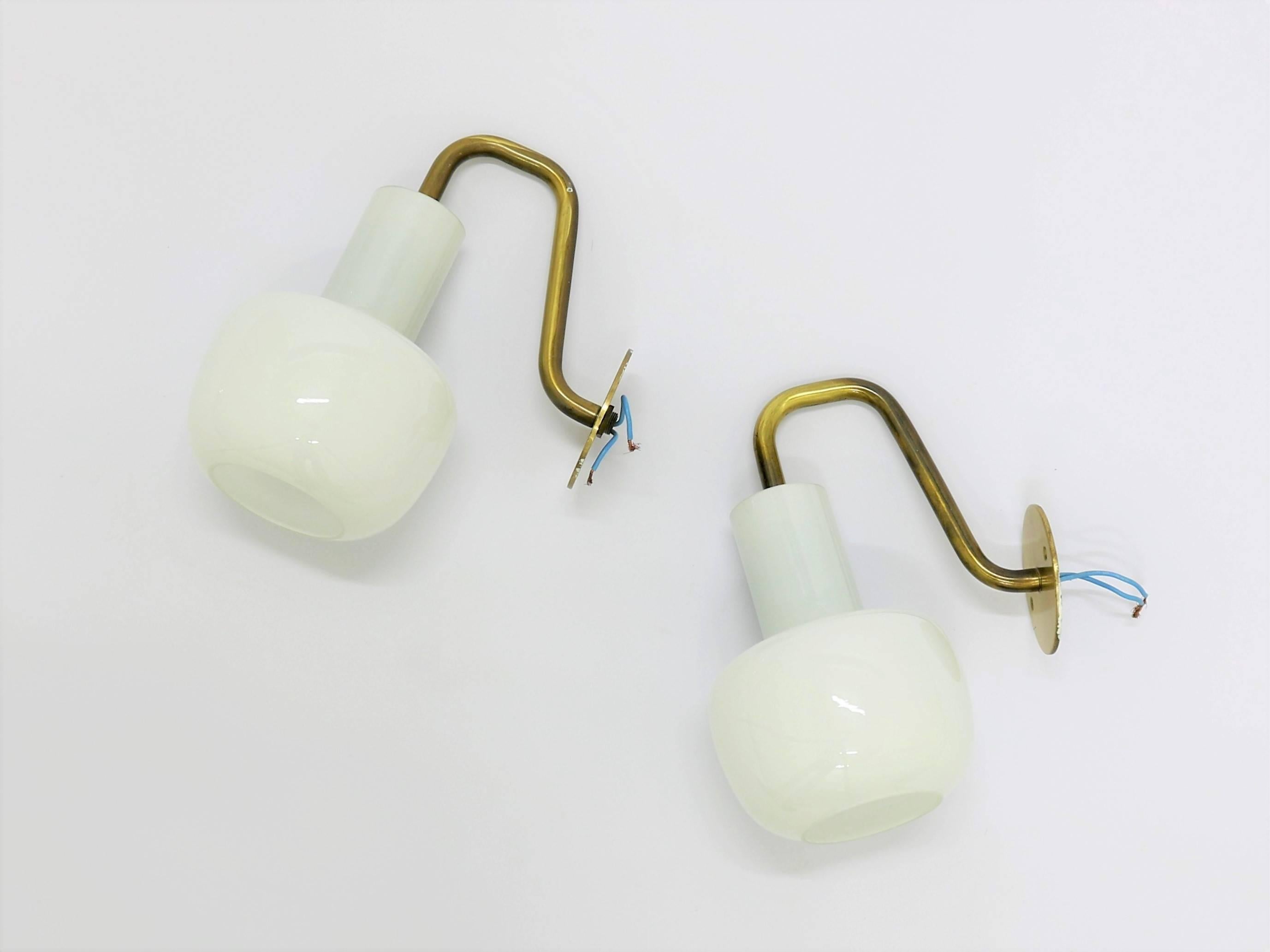 Pair of wall lamps designed by Danish architect Vilhelm Lauritzen and made by Louis Poulsen in 1950s and is a rare find today, as they were made exclusively for 