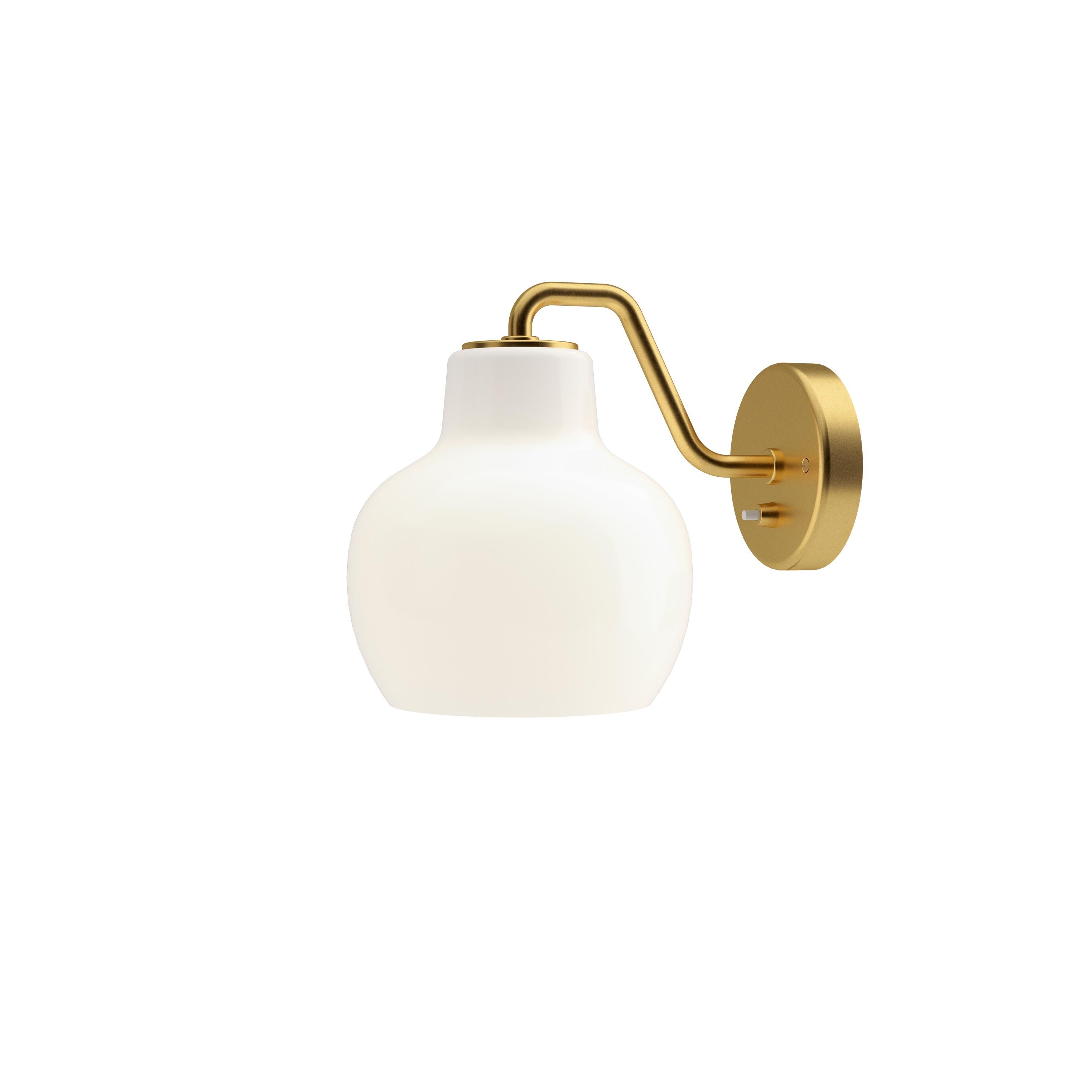 Vilhelm Lauritzen VL-1 brass and glass wall lamp for Louis Poulsen. Executed in a single hand blown glossy white opal glass and unfinished satin polished brass armature and backplate. The sconce emits light directed primarily downwards. The opal