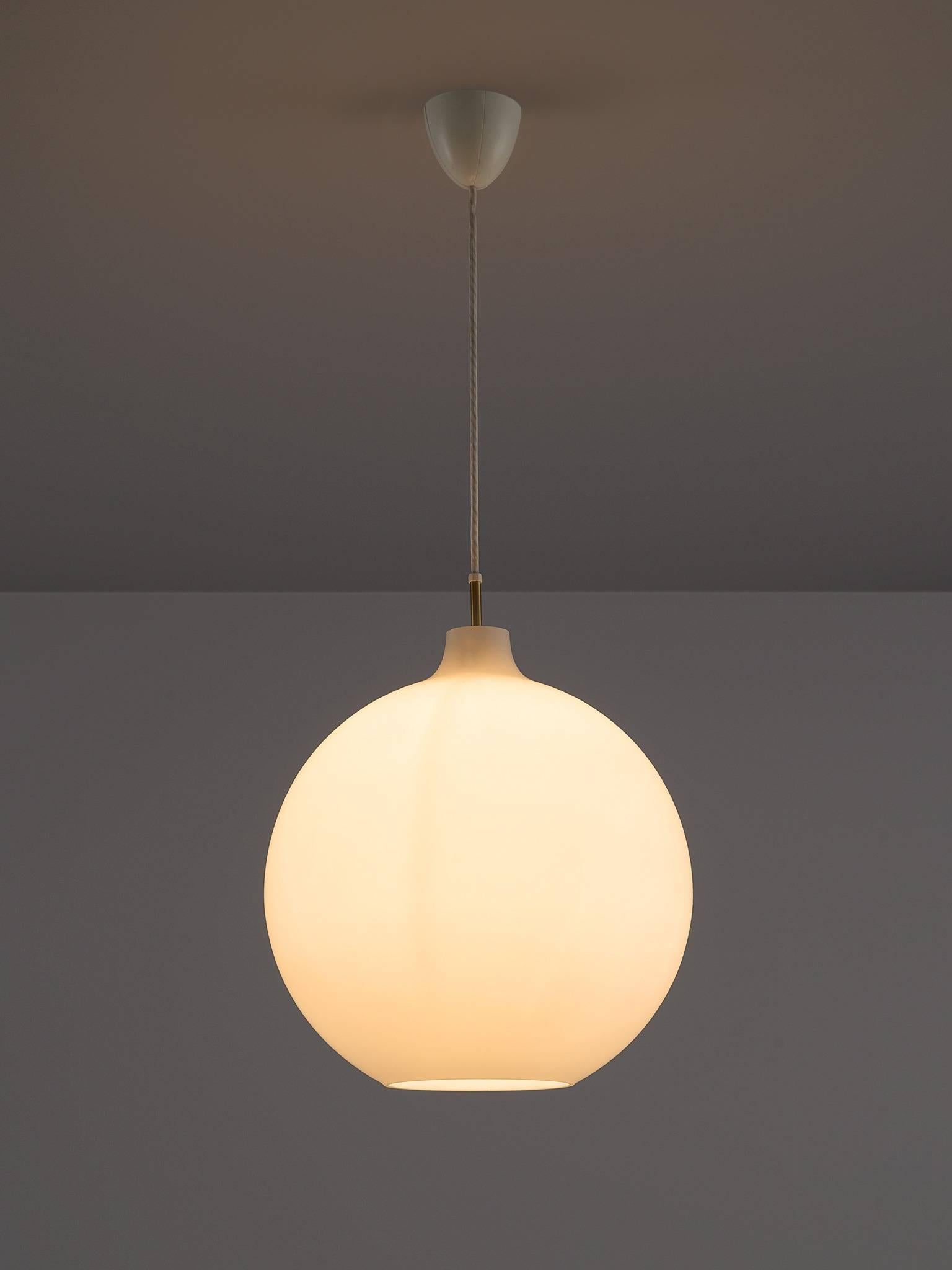 Vilhelm Wohlert for Louis Poulsen, 'Satellit' pendant, opaline glass, brass, Denmark, 1959.

This simplistic, large frosted glass pendant has a minimalist, modest aesthetic. The globe is finished with a brass fitting. The lamp is open at the