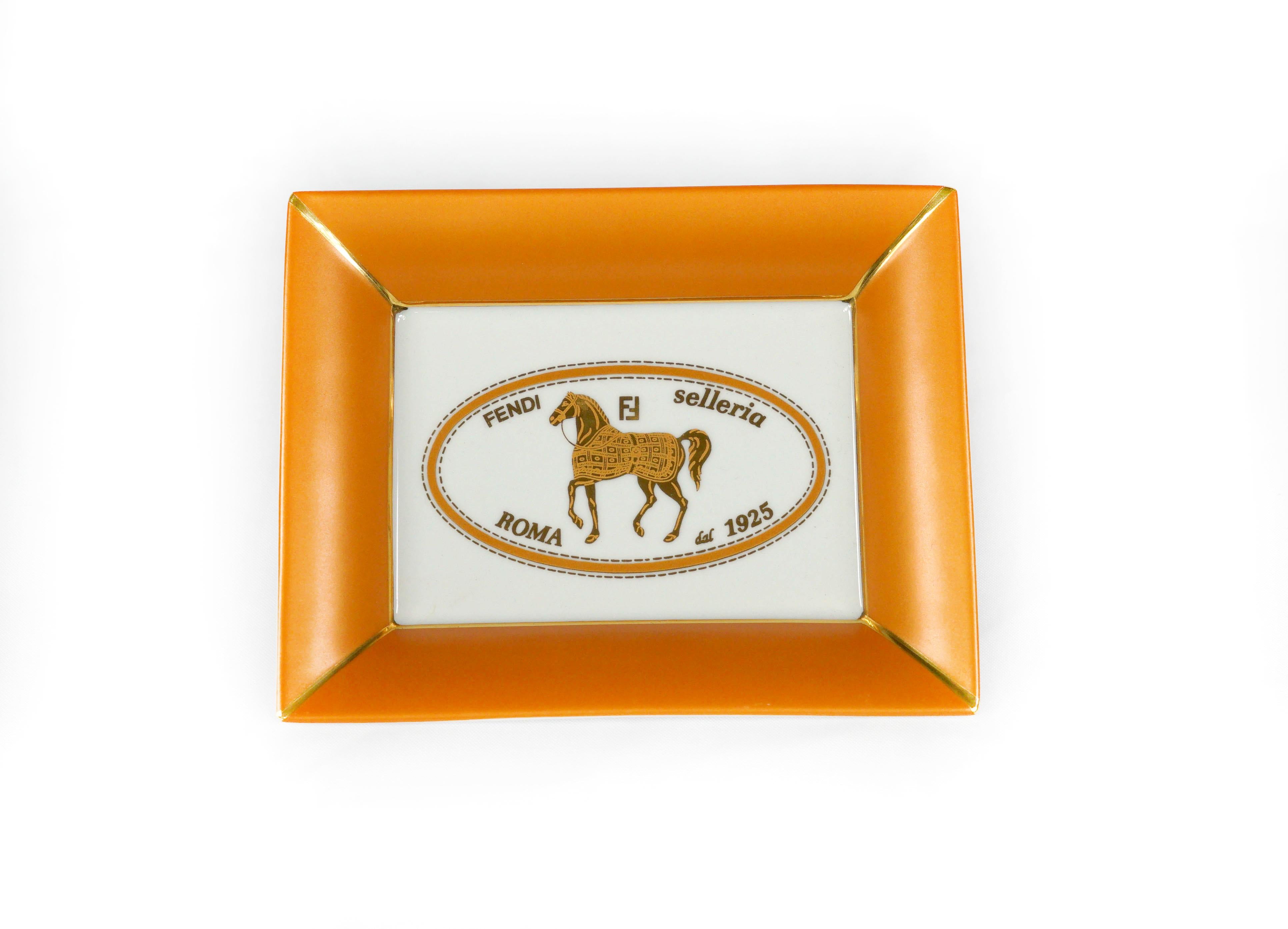 Lovely key tray made from Limoges porcelain with hand painted traditional Fendi Villa Borghese horse design. Copper with gold details.
 