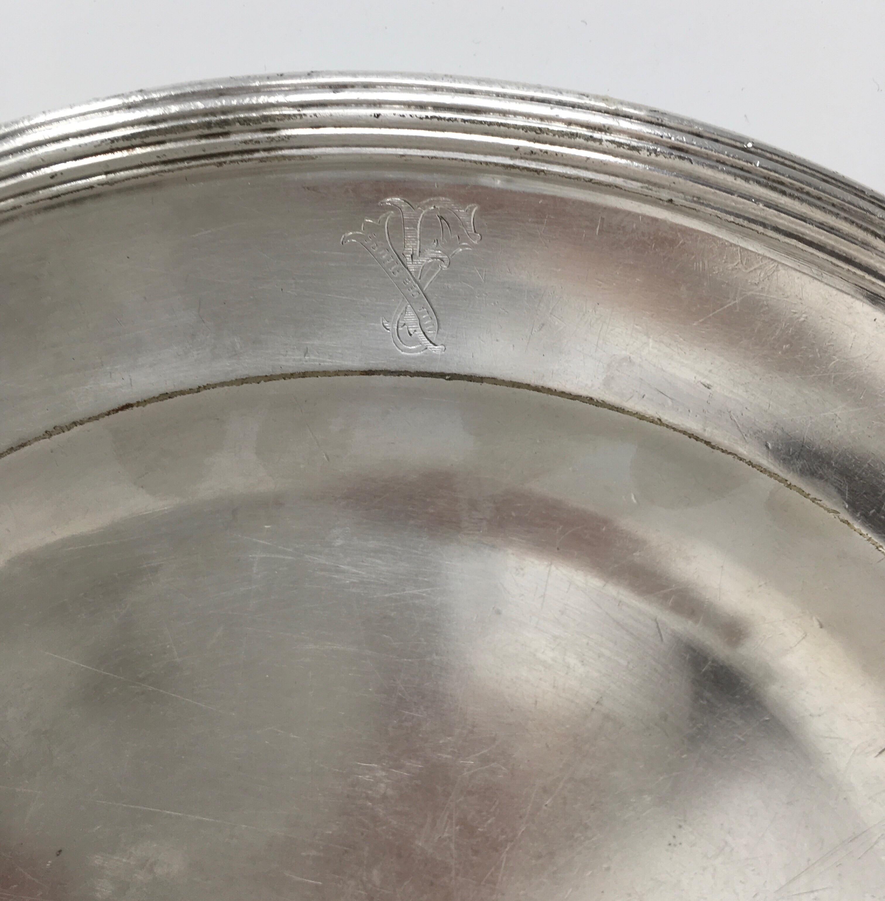 Found in France, this vintage hotel silver serving platter engraved with the Villa de Fleurs logo has a great aged patina. It would be a beautiful in a cabinet and a great addition to your table or buffet.