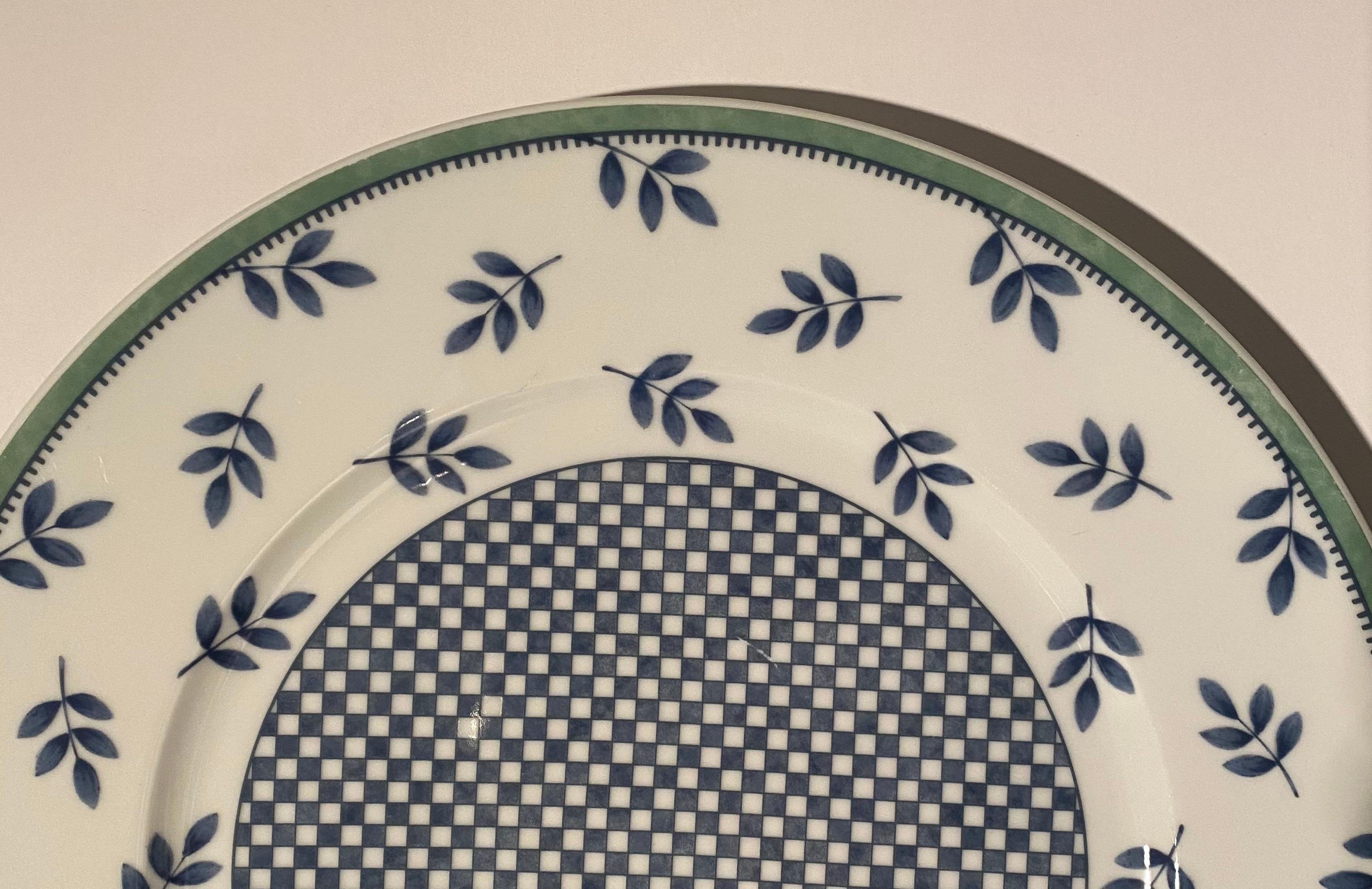 A Villeroy & Boch chop plate or round serving dish in the Switch 3 Castell pattern.

Signed /marked on back. 

Item details:
Measures: Width 12 5/8 inches
Microwave safe, dishwasher safe
Checkerboard, leaf pattern
Discontinued pattern.