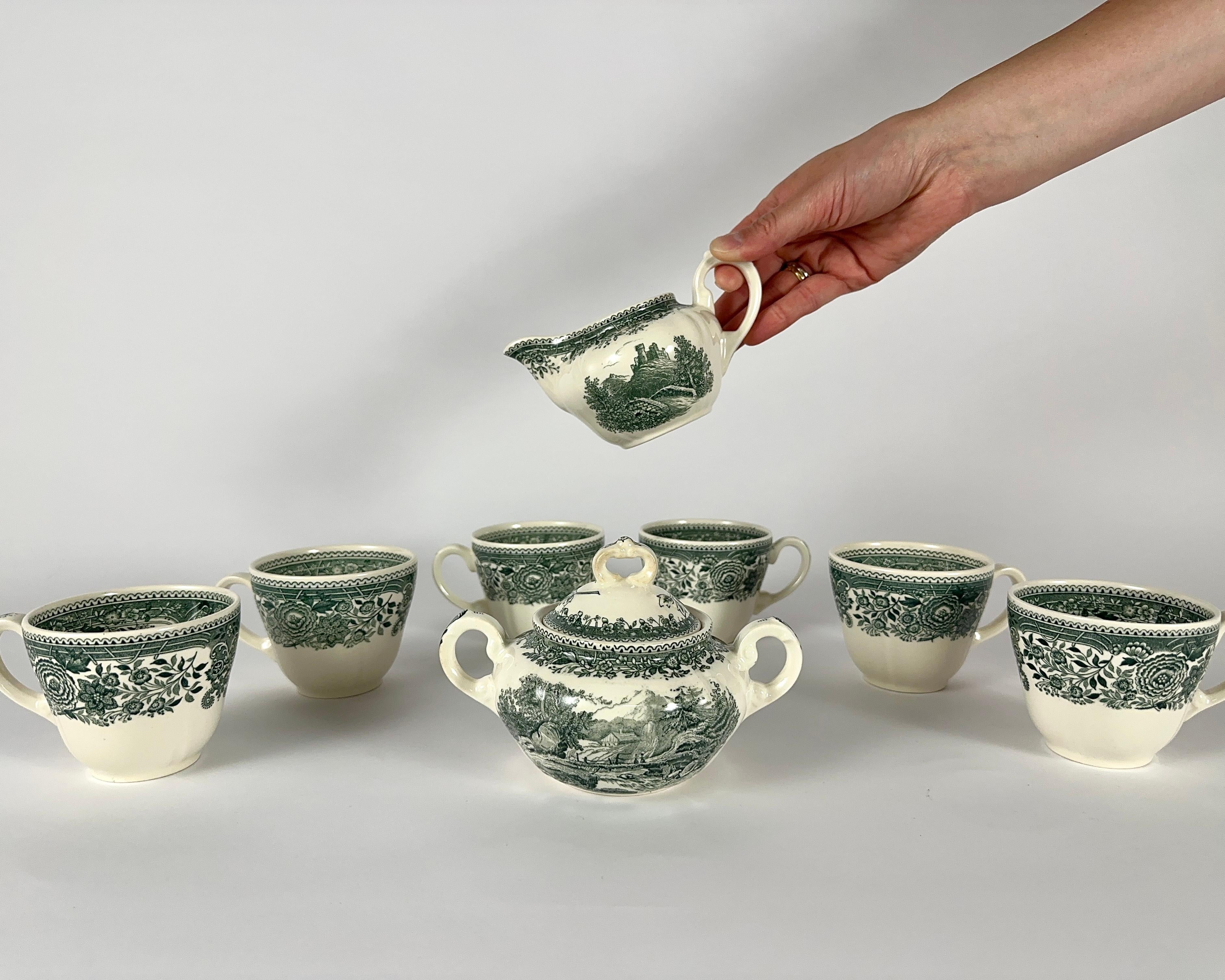 Villeroy & Boch Coffee Set Green Burgenland Series, Germany.

Mettlach ceramics with landscape decorations from Burgenland.

The set includes:

1 sugar bowl - Height: 4 inch - 10 cm. / Width: 6 inch - 15 cm.

1 Creamer - Height: 3 inch - 7.5 cm. /
