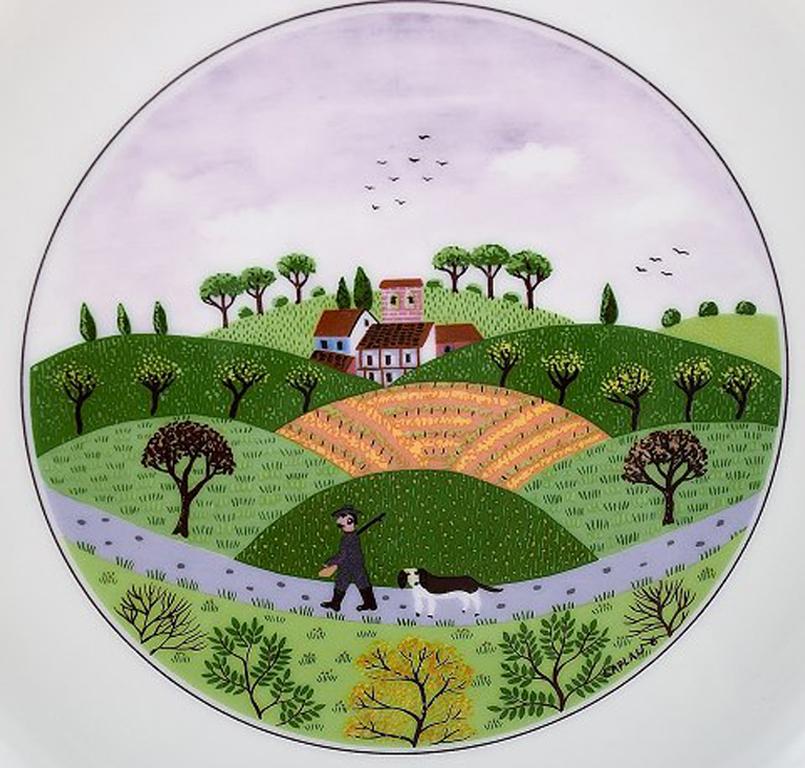 Villeroy & Boch Naif oven proof dish in porcelain decorated with naivist village motif.
In very good condition.
Stamped.
Measures: 23.5 x 3.5 cm.
Designed by Gérard Laplau. Motives of families, villages and biblical scenes in naivist style.
The