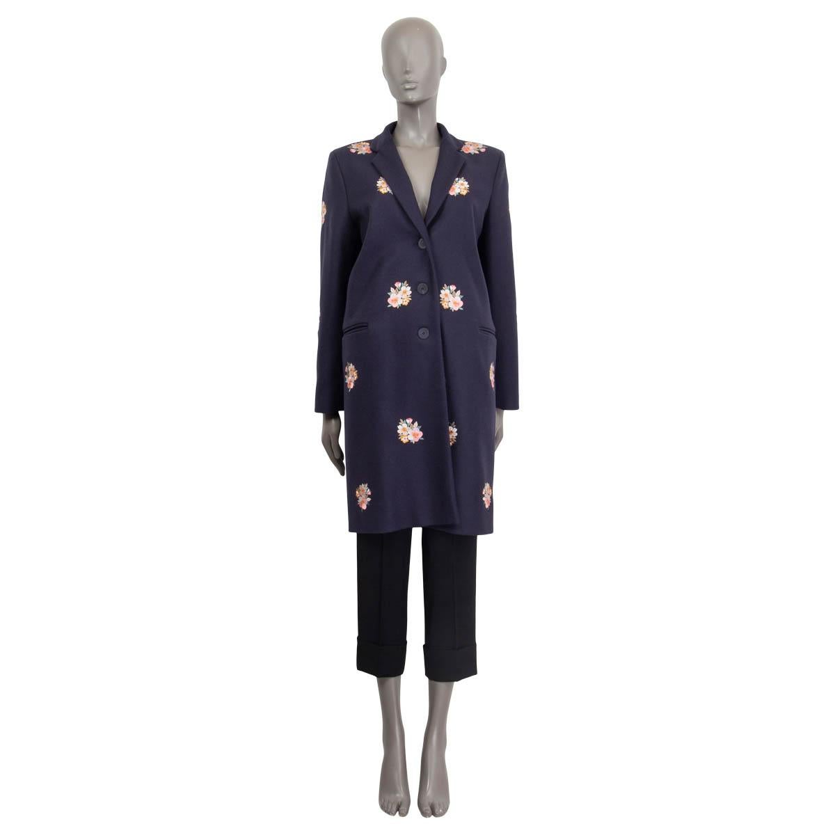 100% authentic Vilshenko flower embroiderer coat in midnight blue virgin wool (50%) and camel (50%). Features a high collar and two slit pockets on the front. Opens with three buttons on the front. Lined in midnight blue viscose (59%) and cotton