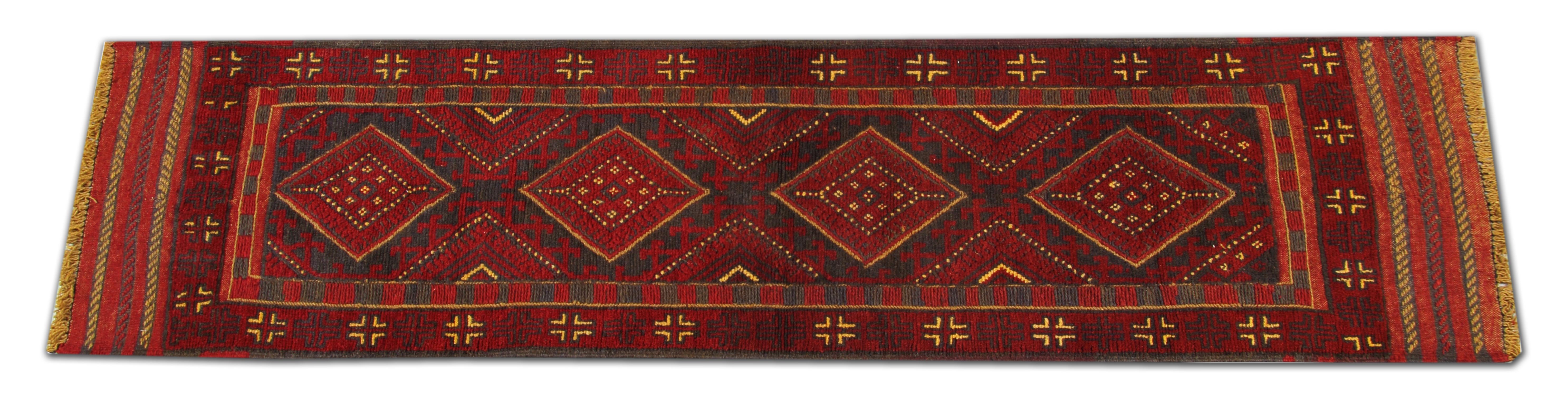 This impressive antique red rug is made from our master weavers in Afghanistan. These particular carpet runners are made with all-natural vegetable dyes. The patterned rugs display an all-over geometrical rug pattern. This woven rug also has an