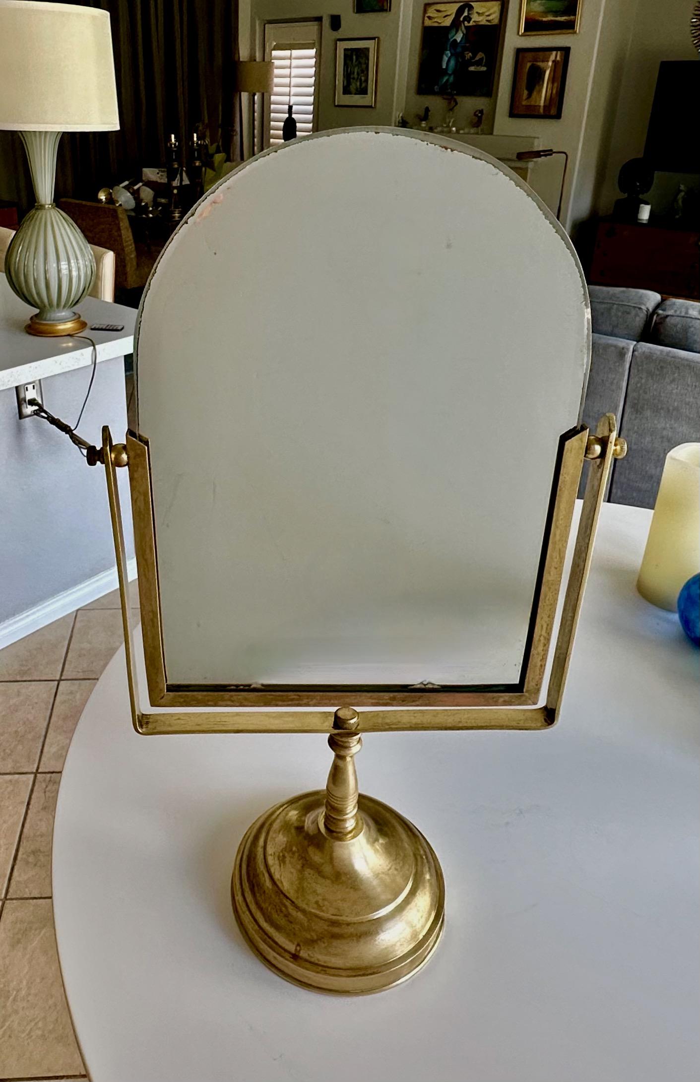 Solid brass vintage swivel vanity table mirror.