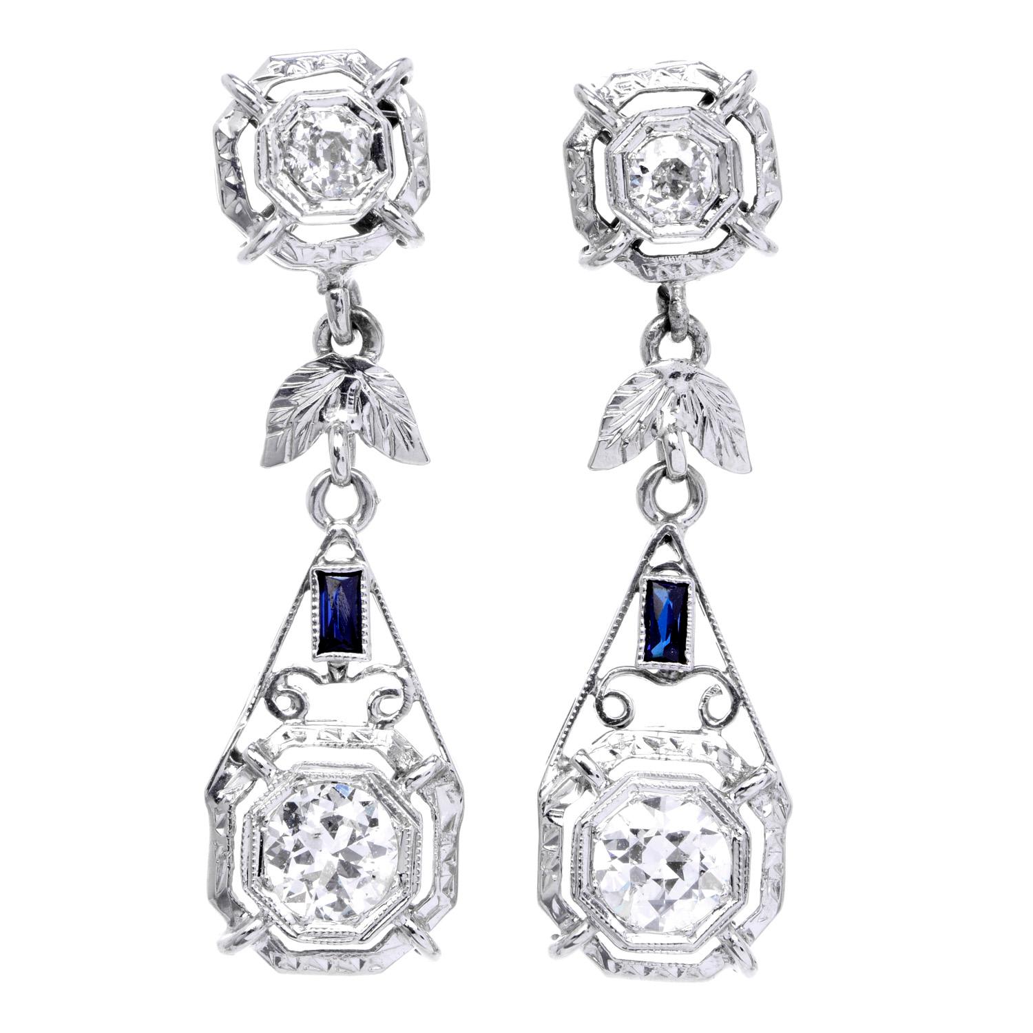 Antique Deco Floral inspired, dangle Drop Earrings!

These very sparkly Diamond earrings were crafted in luxurious Platinum.

With (4) European Round cut diamonds set into Octagonal shaped bezels, weighing approximately 1.15 carats (G-H color and SI