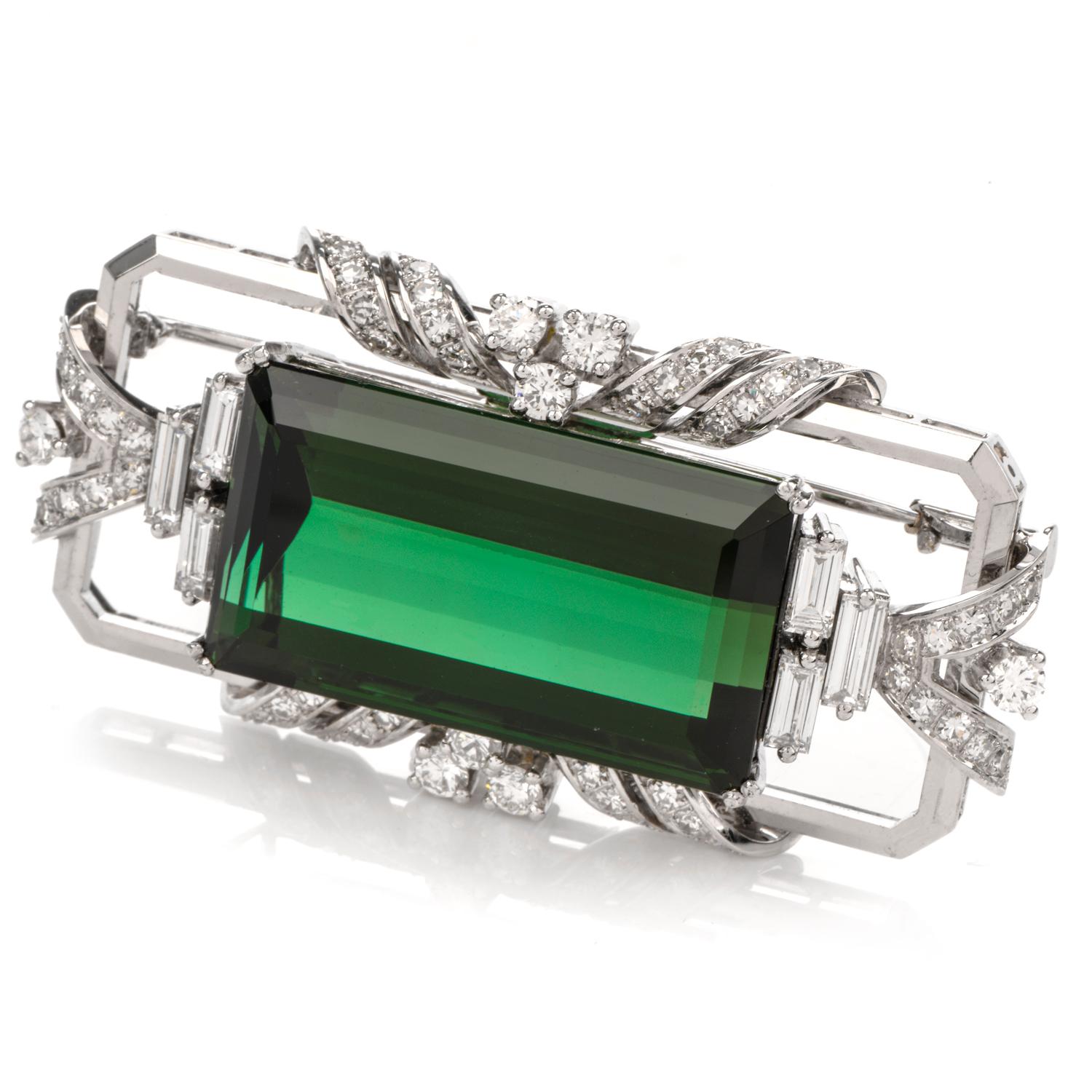 This sophisticated High quality tourmaline and diamond pin brooch is hand exceptionally hand crafted in solid 18-karat white gold, weighing 21 grams and measuring 47mm long 23mm wide. Showcasing one prong set rectangular tourmaline of deep green