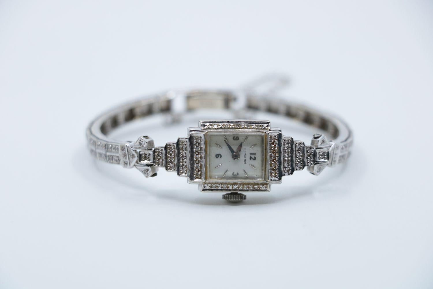 Vintage Hamilton 14K White Gold Diamond Watch Bracelet

Marked:
14K

Approximate Dimensions:
15.5 cm ( Length) 
0.5 cm - 1.5 cm (Width)  
19.5 grams in weight