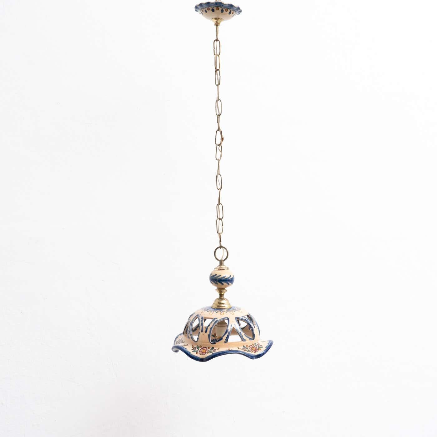 Antique ceramic ceiling lamp.

By unknown manufacturer, made in circa 1950.

In original condition, with minor wear consistent with age and use, preserving a beautiful patina.

Materials:
Ceramic.
 
Electrification not tested.