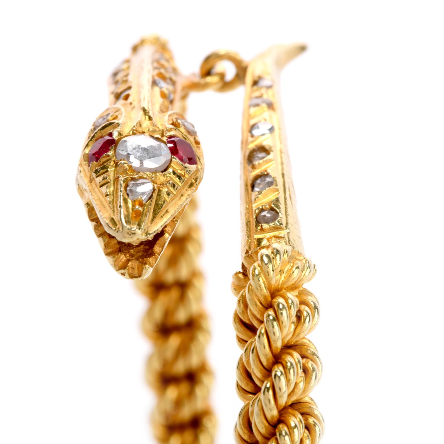 This Over-sized Vintage snake bangle bracelet made in 18k yellow gold.
Its sculpted body wraps around the your wrist.
The snake body is made of hand twisted18k yellow gold  wire like a rope with solid gold head and tail set with antique rose- cut