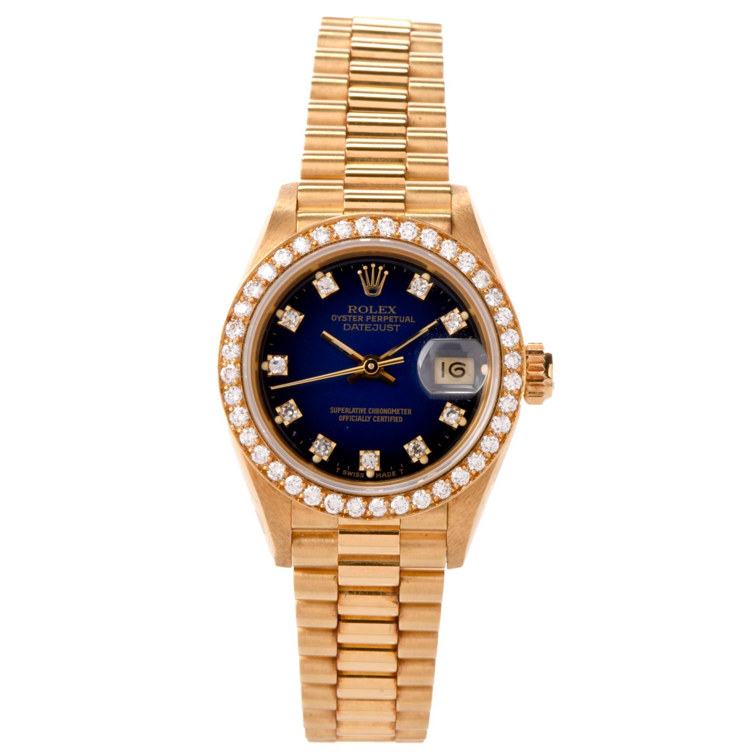 Ladies Rolex  28 mm ref 69138 

18k yellow gold case Rare Rolex Blue Dial with Factory set Diamond bezel with diamond dial with luminous hands. 

 Date display at 3 o'clock position, quickset date function. 

Sapphire crystal glassl, original 18k