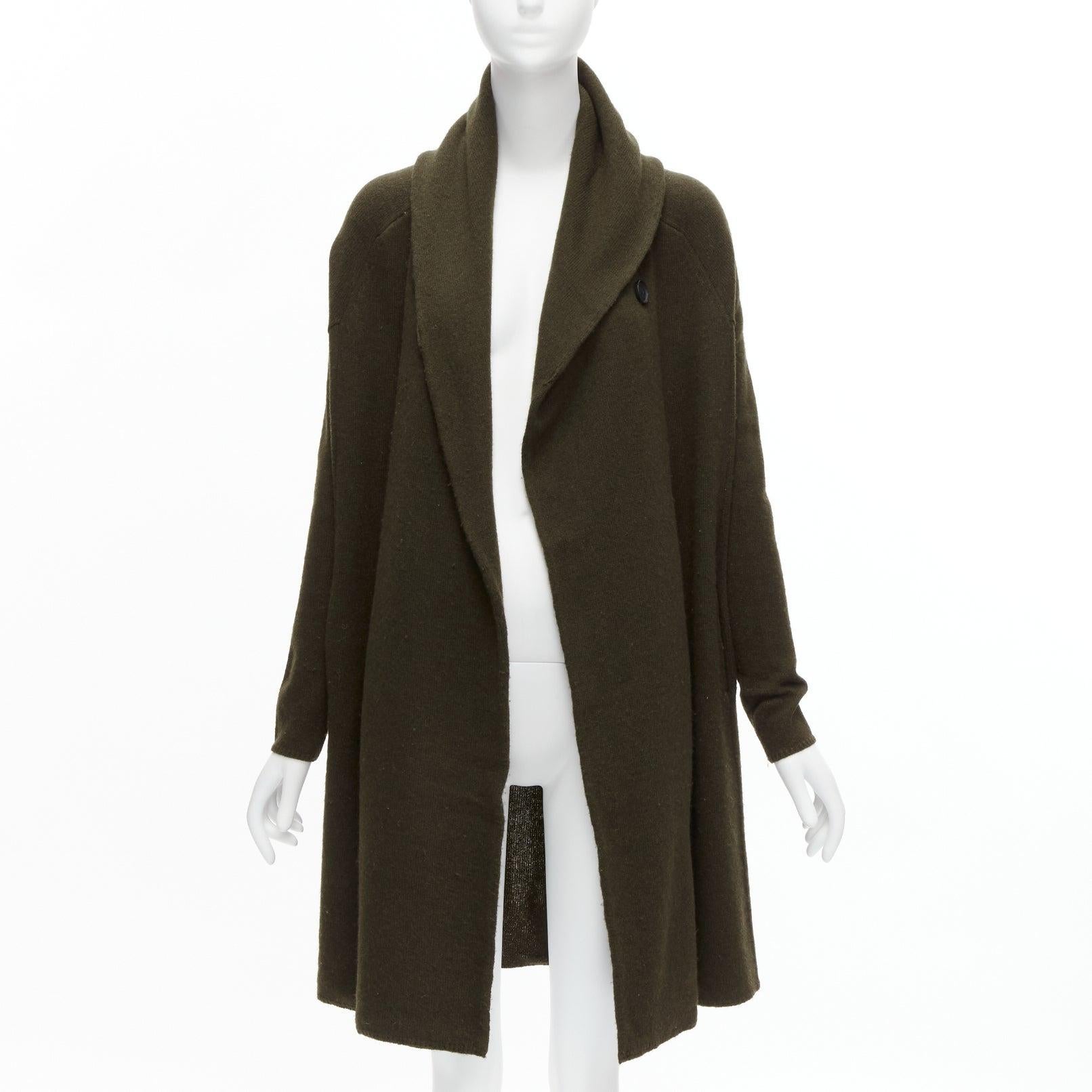 VINCE army green yak wool shawl neck single button wrap cardigan coat XXS
Reference: SNKO/A00267
Brand: Vince
Material: Wool
Color: Green
Pattern: Solid
Closure: Button
Extra Details: Single button closure. Wrap shawl collar. Leather patch at back