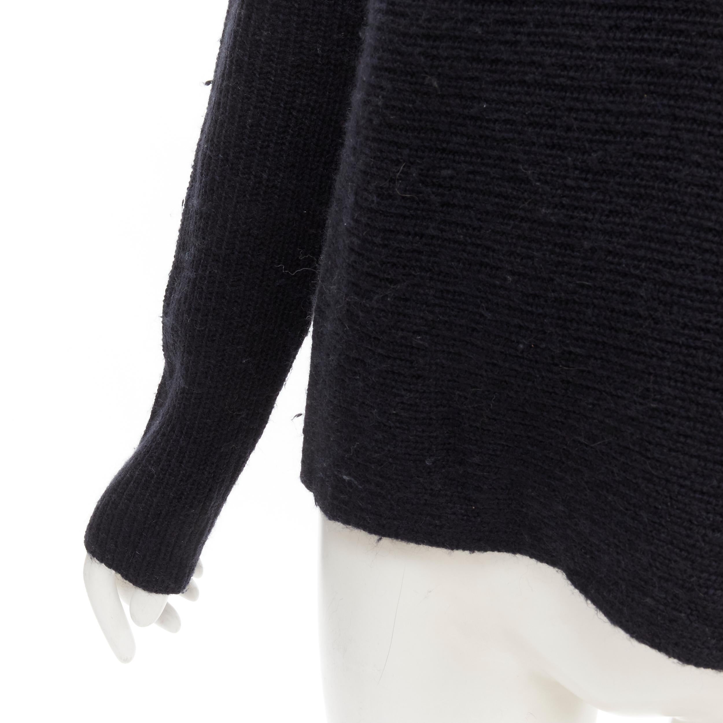 VINCE black merino wool blend boat wide boat neck high low sweater M
Brand: Vince
Material: Merino Wool
Color: Black
Pattern: Solid
Made in: China

CONDITION:
Condition: Excellent, this item was pre-owned and is in excellent condition. pilling on