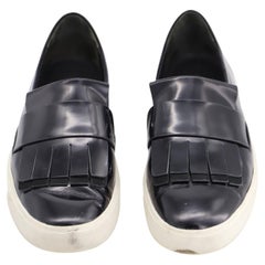 Vince Conventry Kiltie Fringe Slip-On Sneakers in Black Leather