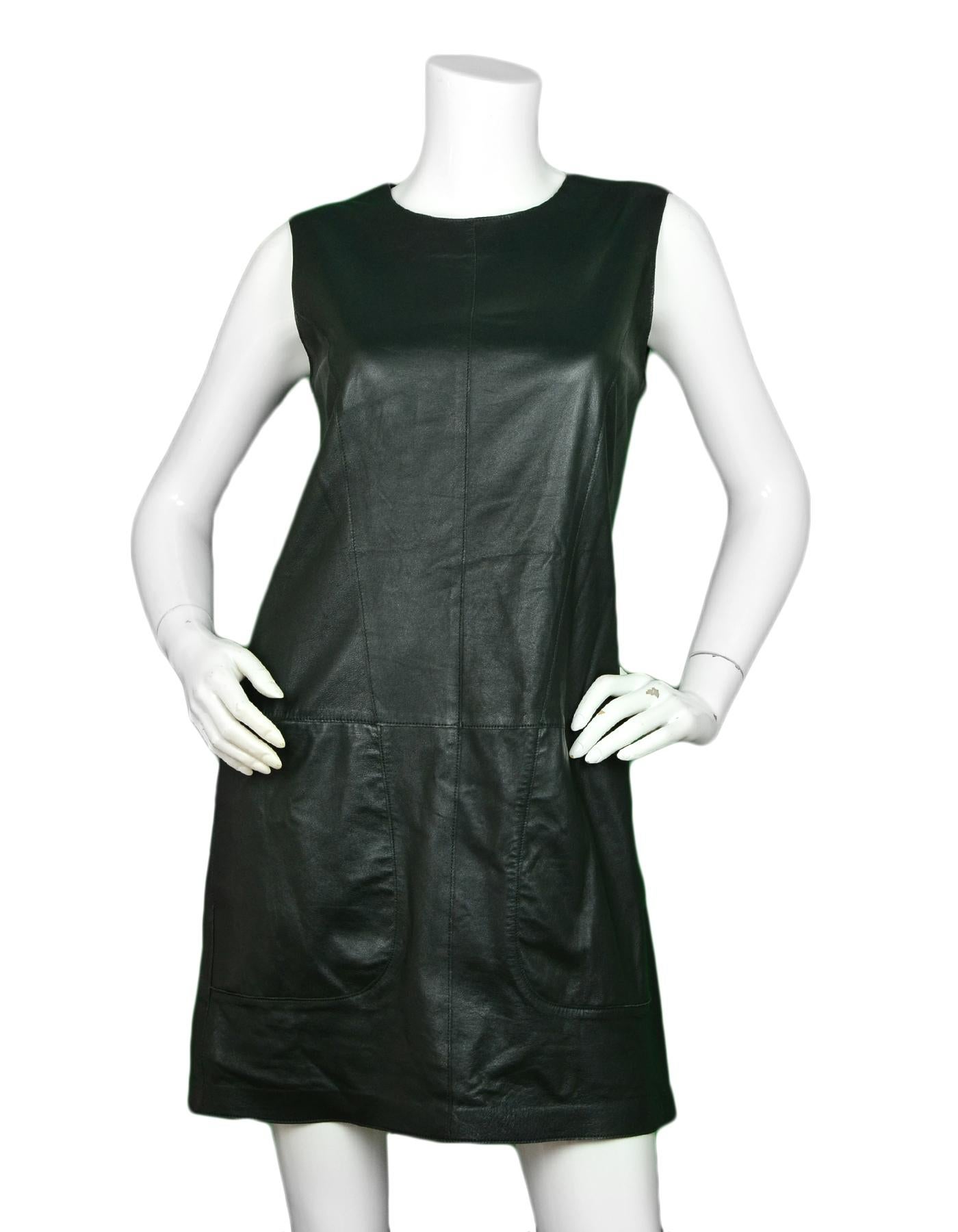 Vince Green Leather Sleeveless Dress sz 6

Made In: China
Color: Hunter green 
Materials: Leather (missing composition tag)
Opening/Closure: Back hidden zipper 
Overall Condition: Very good pre-owned condition, with light creasing to underarms,
