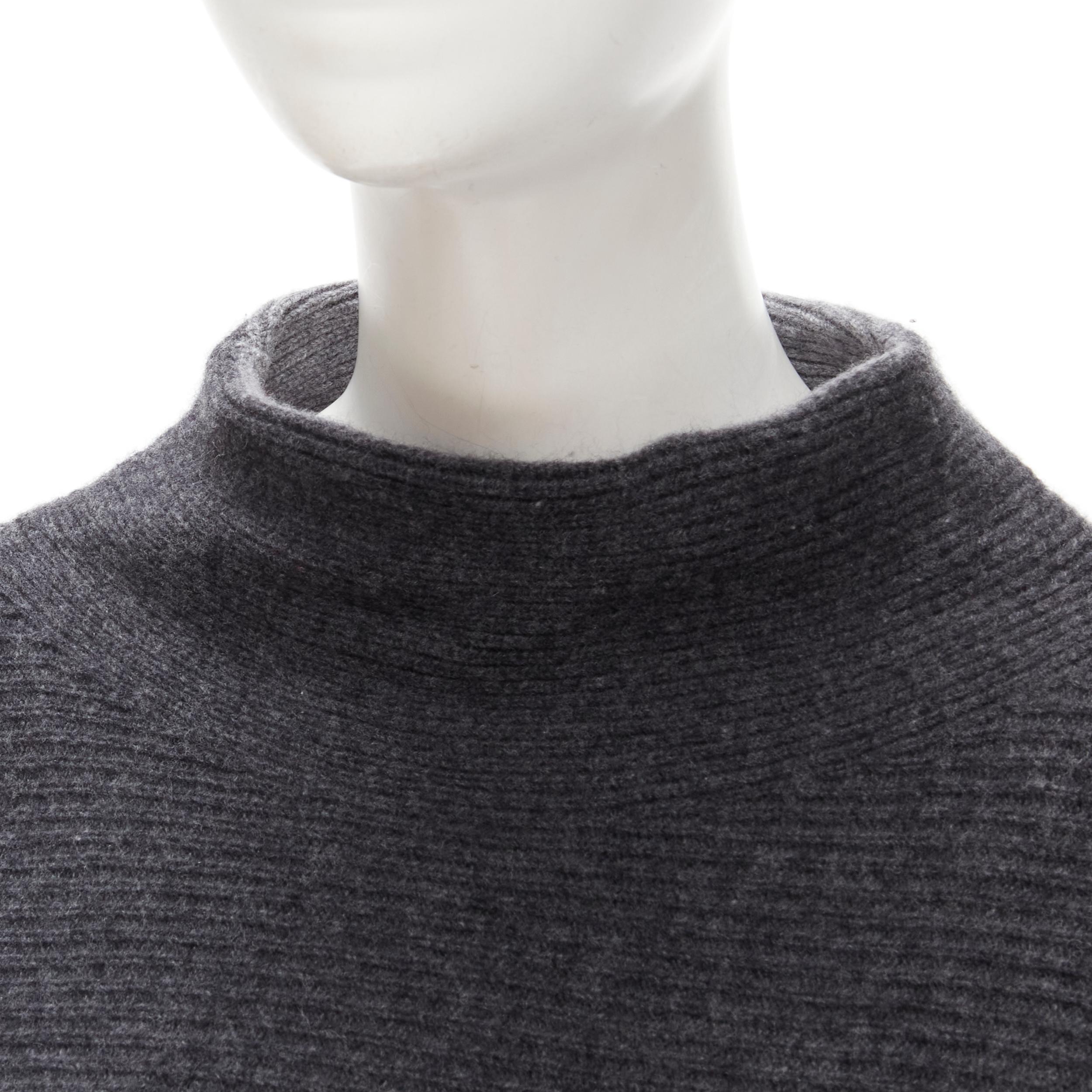 VINCE merino wool cashmere blend ribbed knit mock neck oversized sweater XS
Brand: Vince
Material: Merino Wool
Color: Grey
Pattern: Solid
Made in: China

CONDITION:
Condition: Excellent, this item was pre-owned and is in excellent condition.