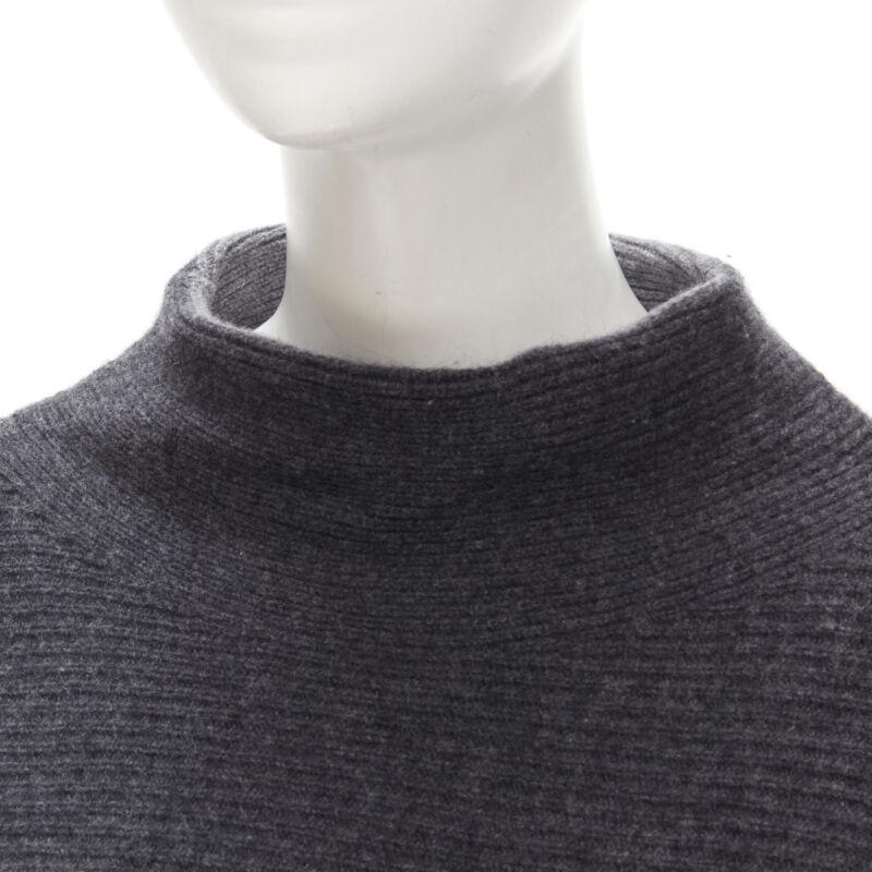 VINCE merino wool cashmere blend ribbed knit mock neck oversized sweater XS
Reference: KNLM/A00096
Brand: Vince
Material: Merino Wool, Cashmere
Color: Grey
Pattern: Solid
Made in: China

CONDITION:
Condition: Excellent, this item was pre-owned and